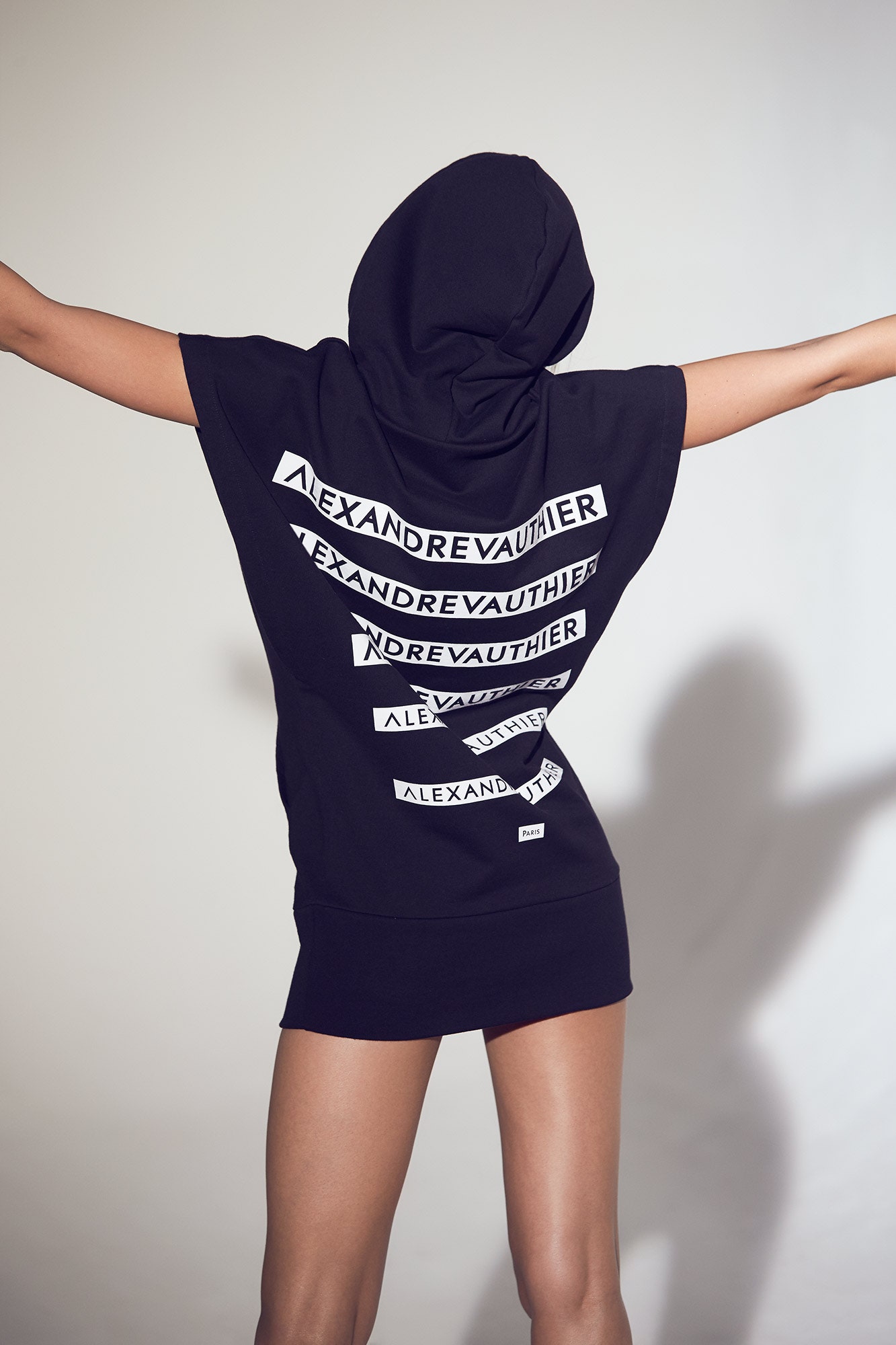 black hooded sleeveless dress