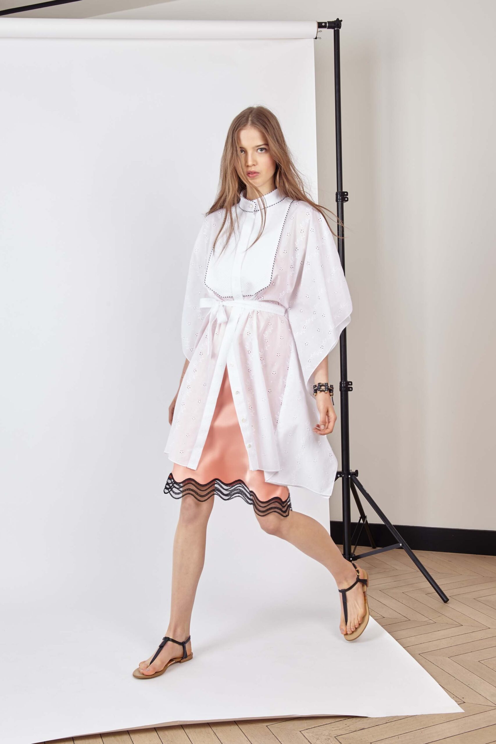 pink mini dress with white coat