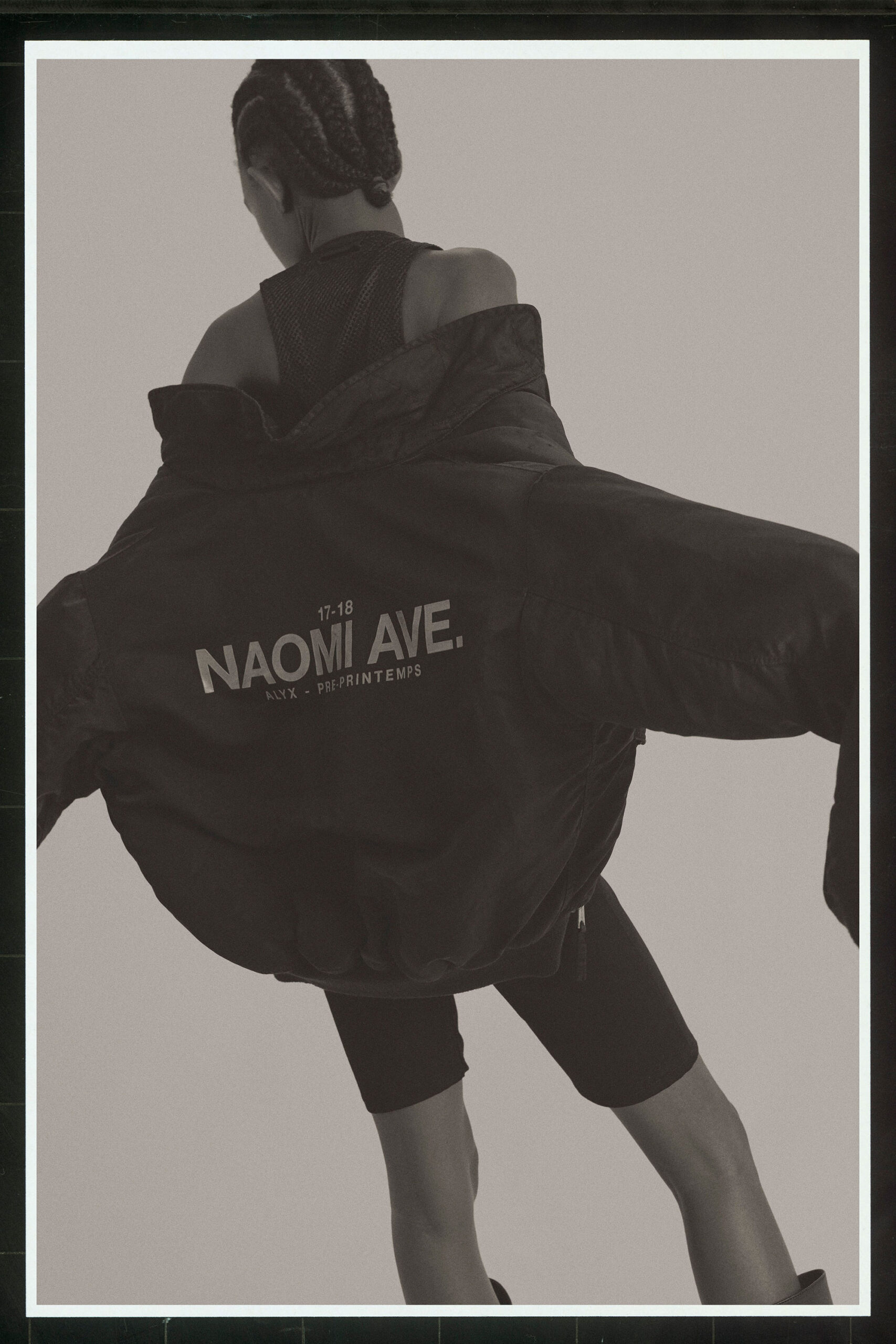black oversized jacket and fitted shorts