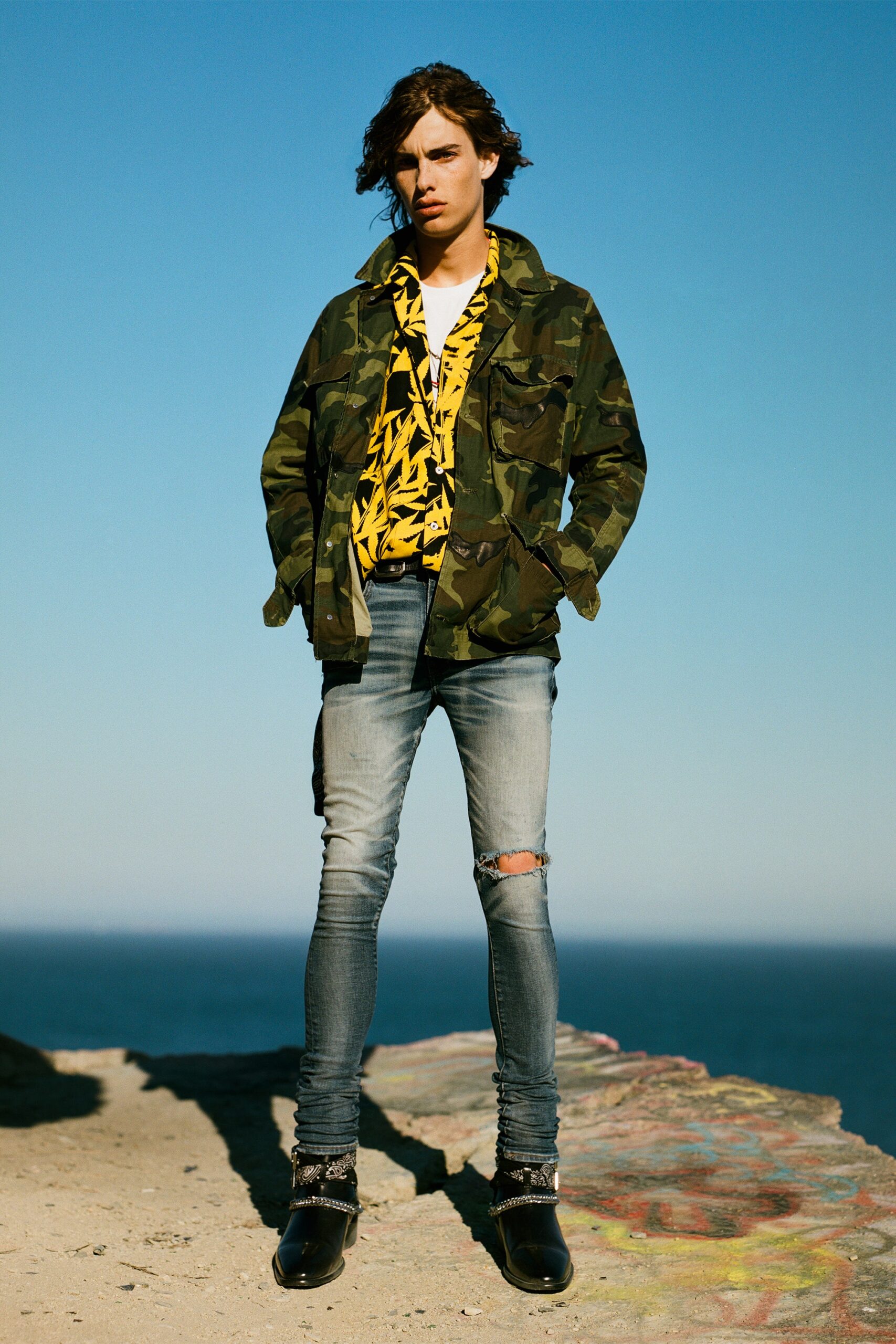 camouflage jacket with printed shirt