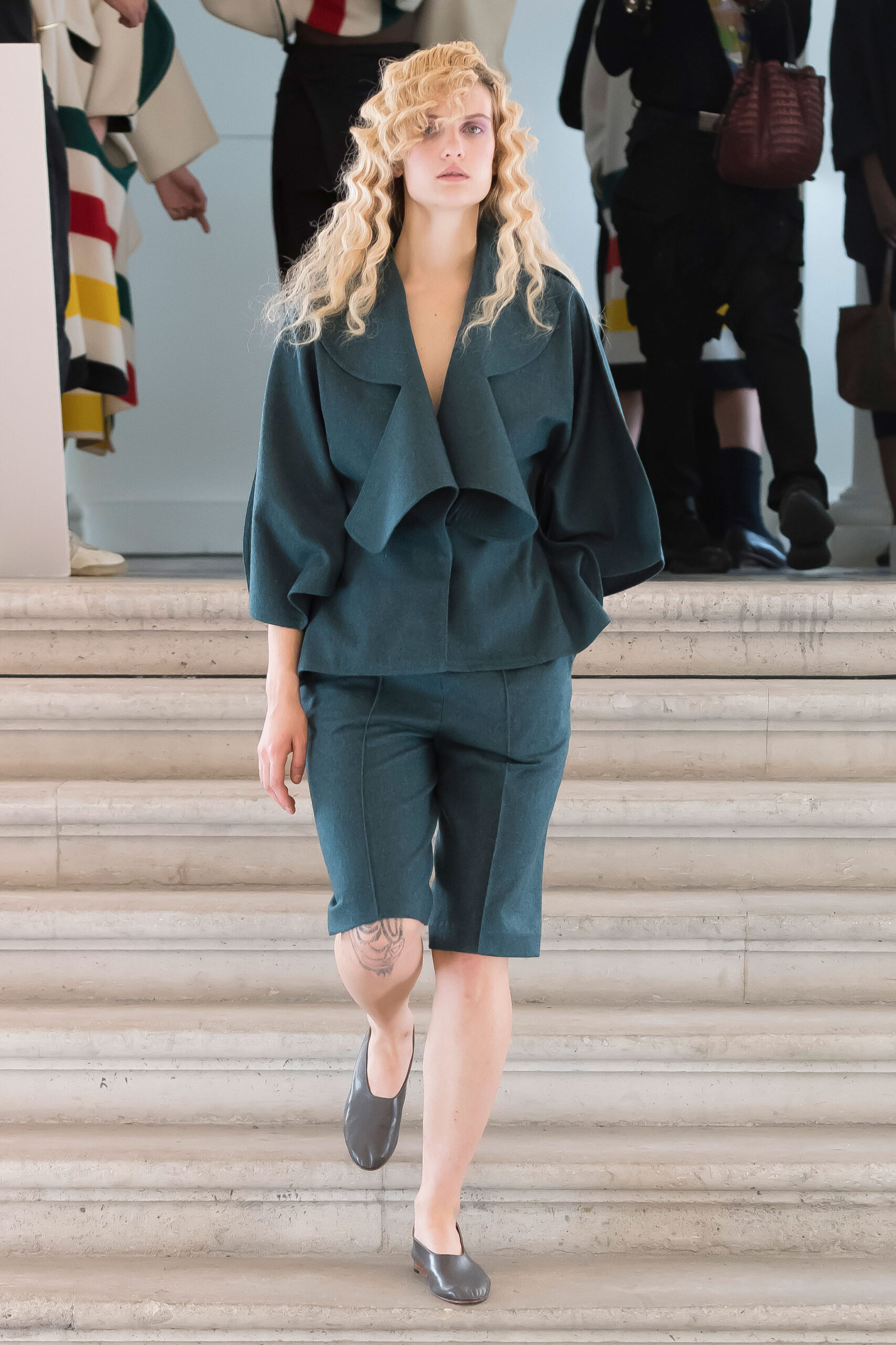 teal relaxed jacket and fitted shorts