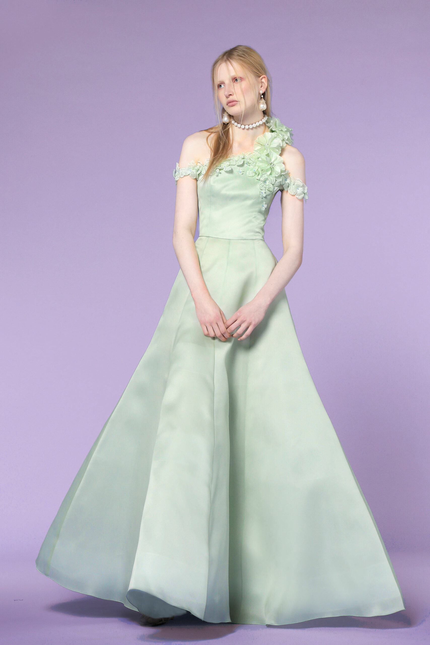 green silk off-shoulder gown