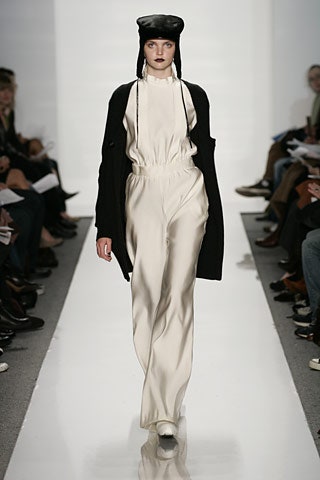 white silk long-sleeve high-neck fitted zippered jumpsuit