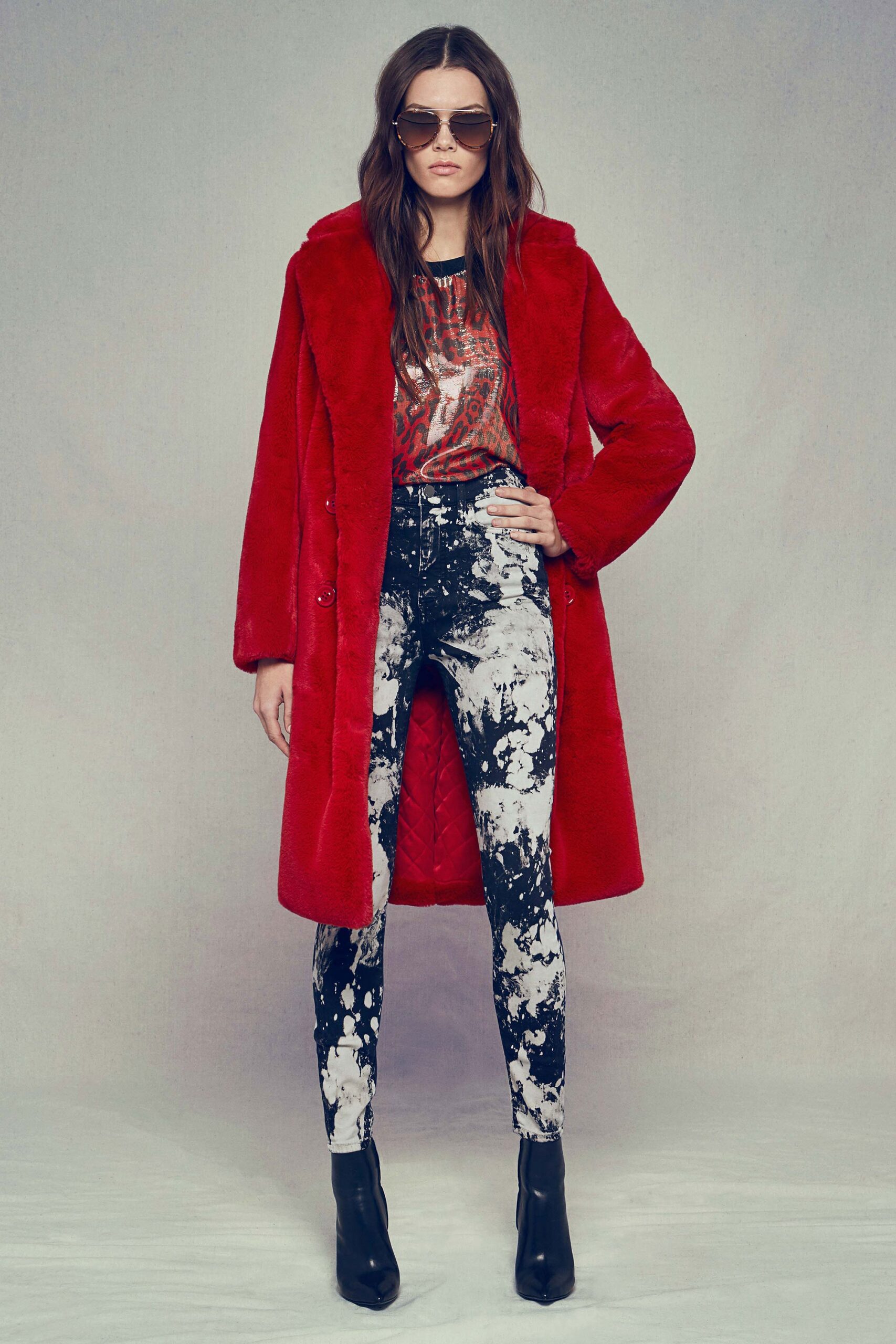 red faux-fur coat with printed top