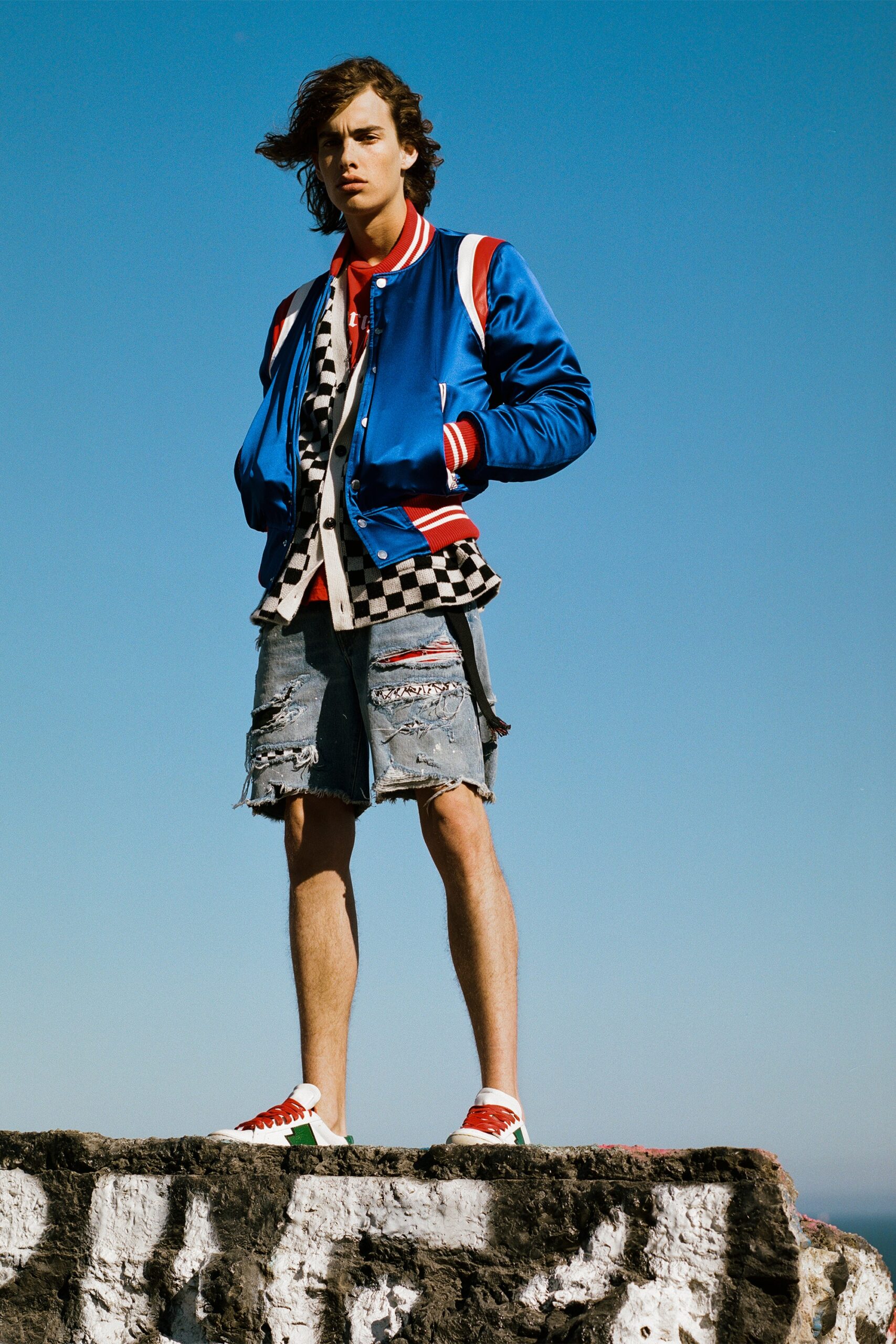 blue color-blocked jacket with denim shorts
