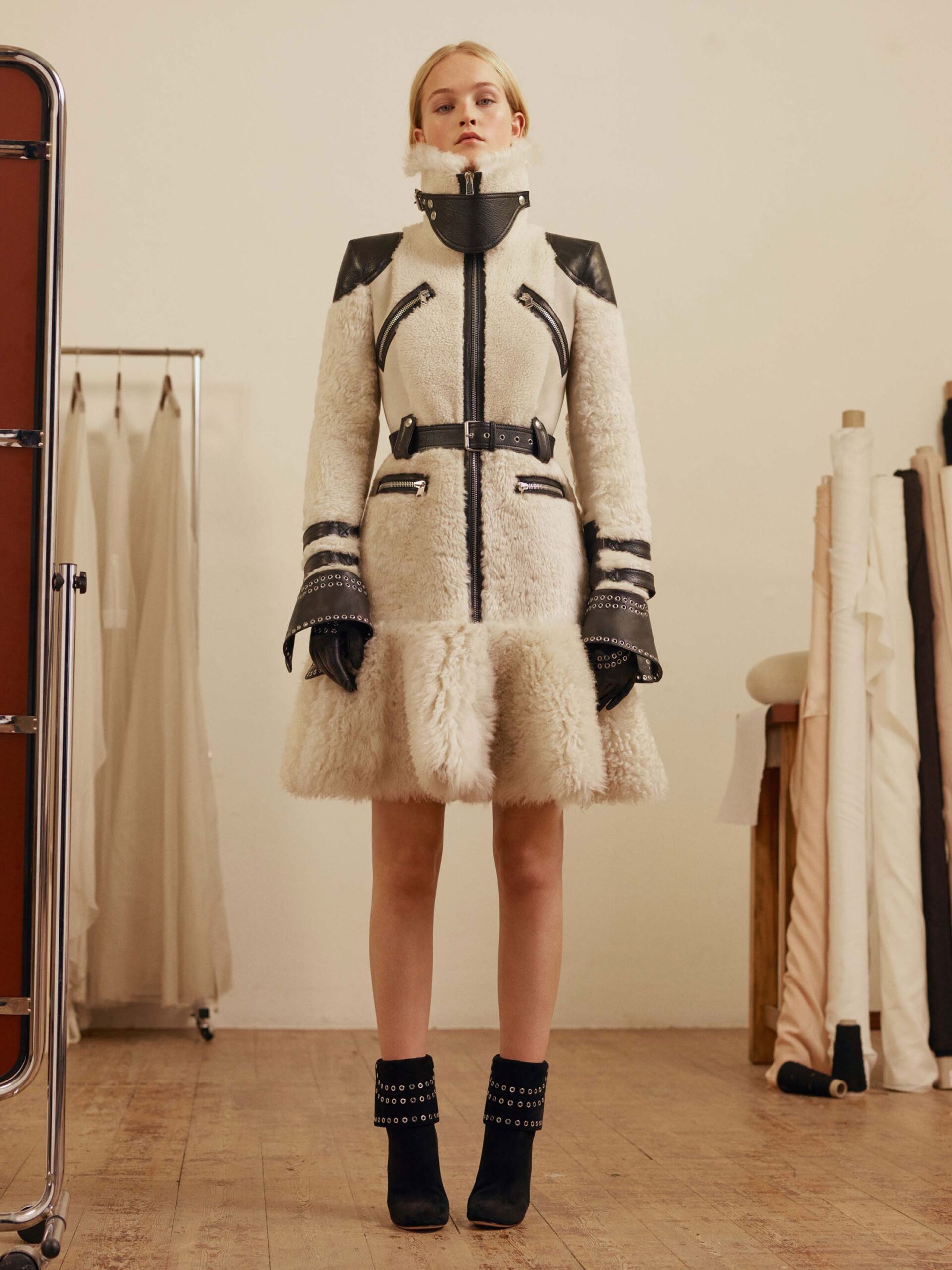 white fur long-sleeve high-neck fitted zippered pockets coat