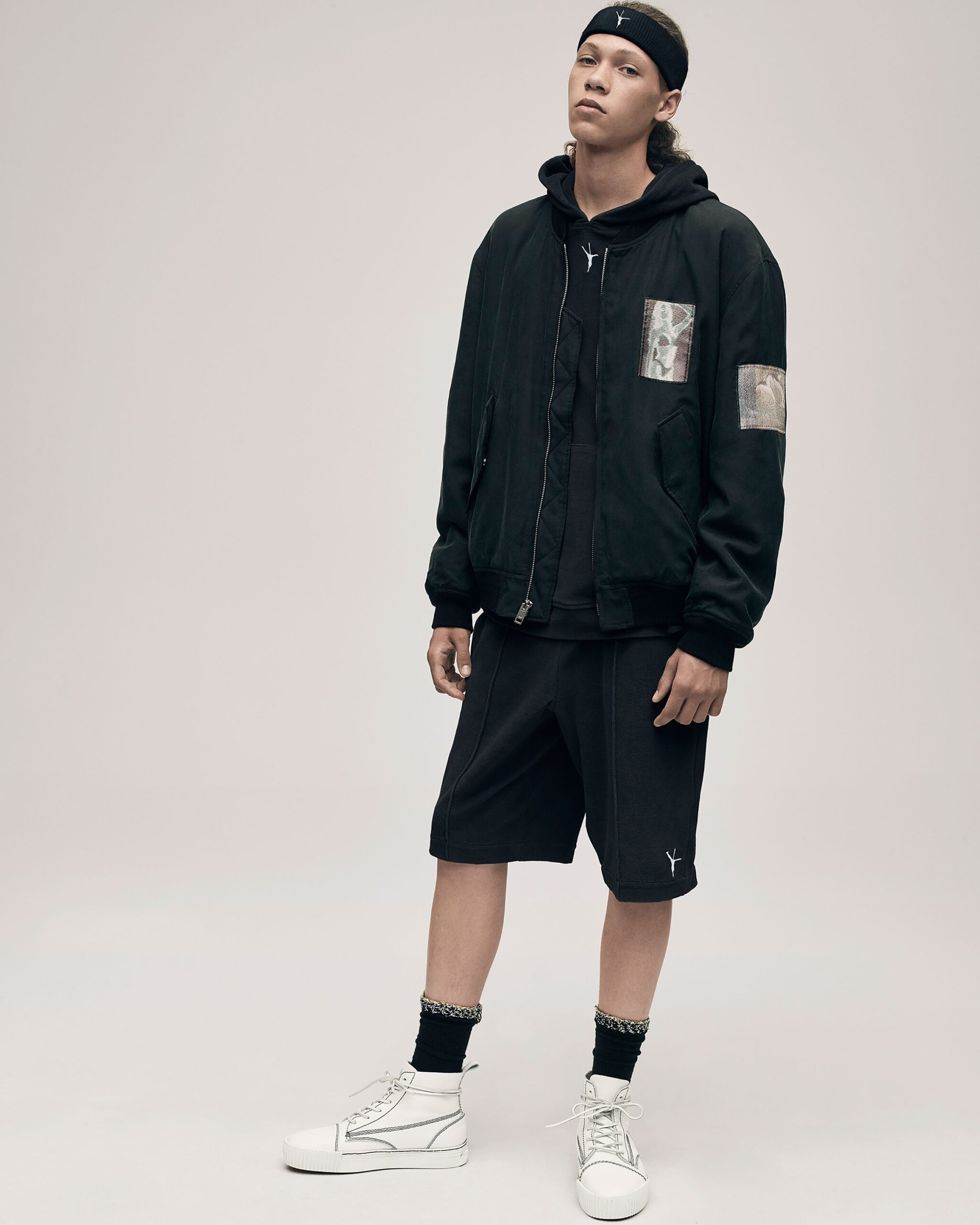black relaxed jacket with hoodie and shorts