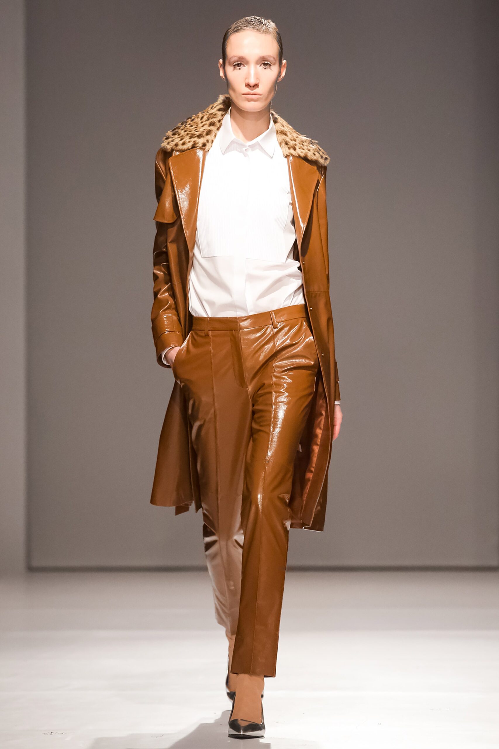 brown vinyl fitted straight-leg shiny pants