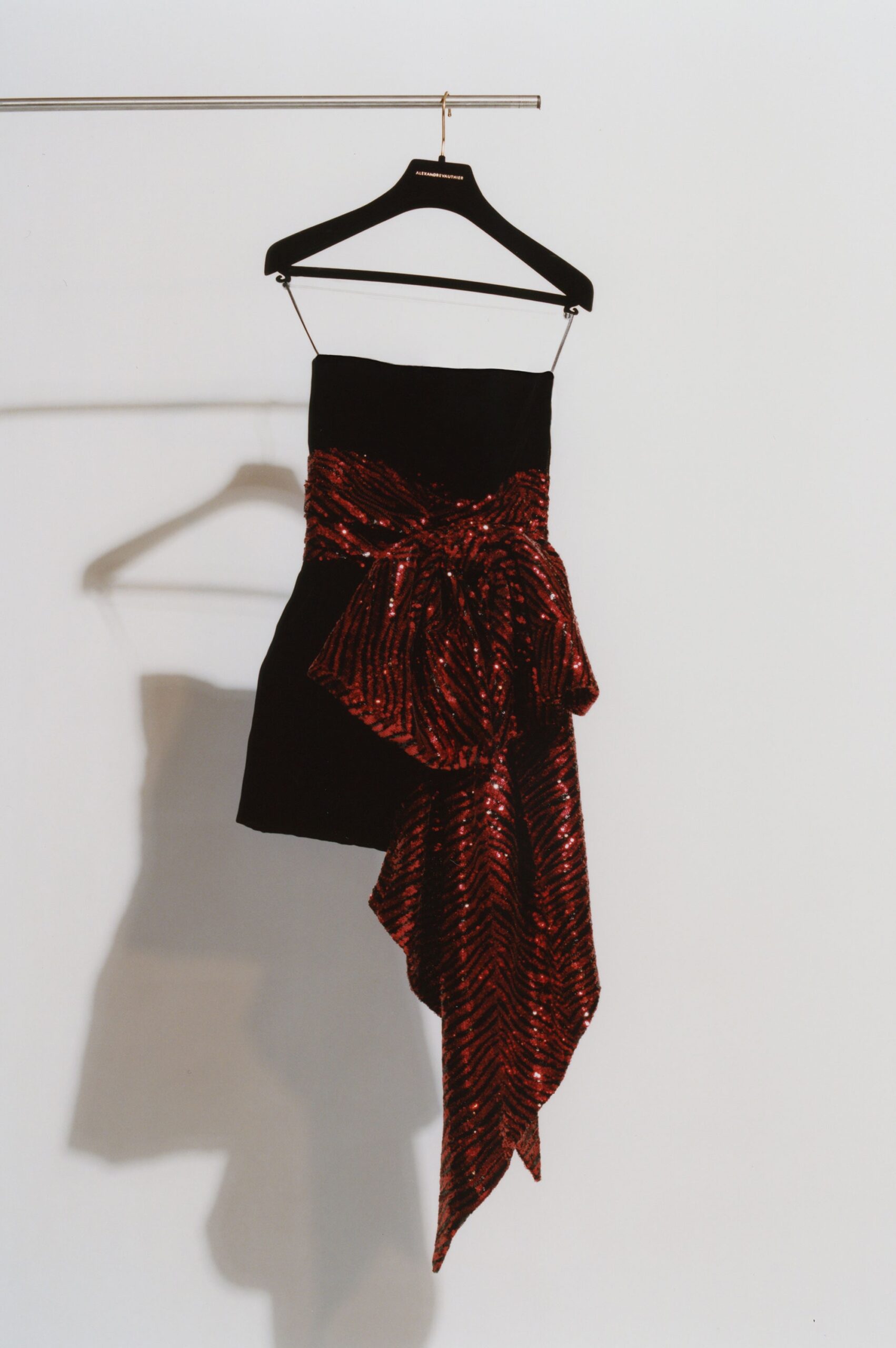 black and red sequined strapless dress