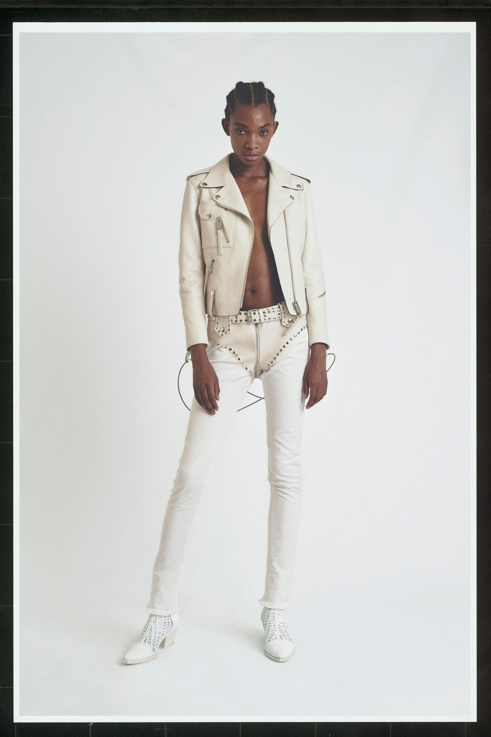 white leather fitted jacket and pants