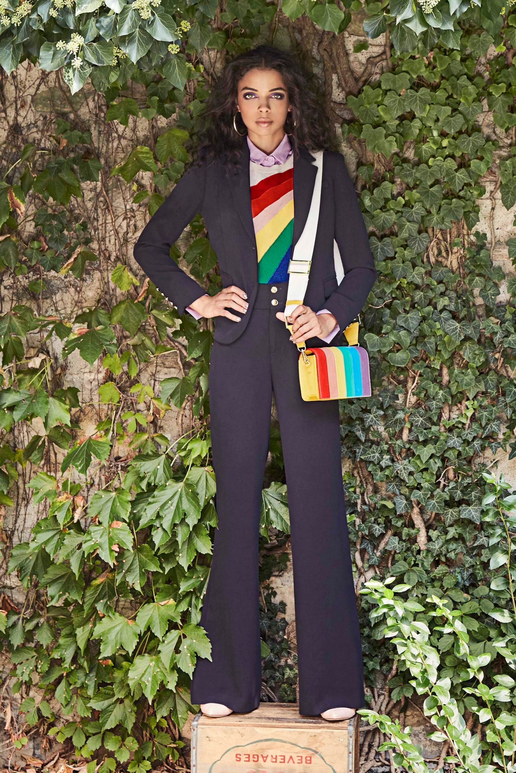 black long-sleeve collared tailored buttoned flared suit