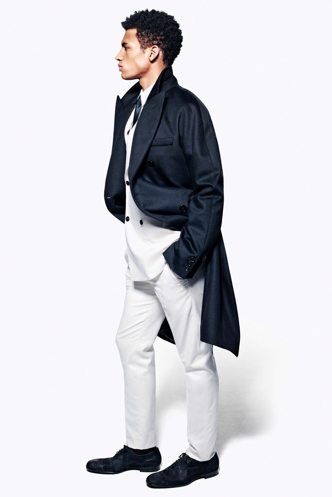 black wool long-sleeve collared structured layered coat