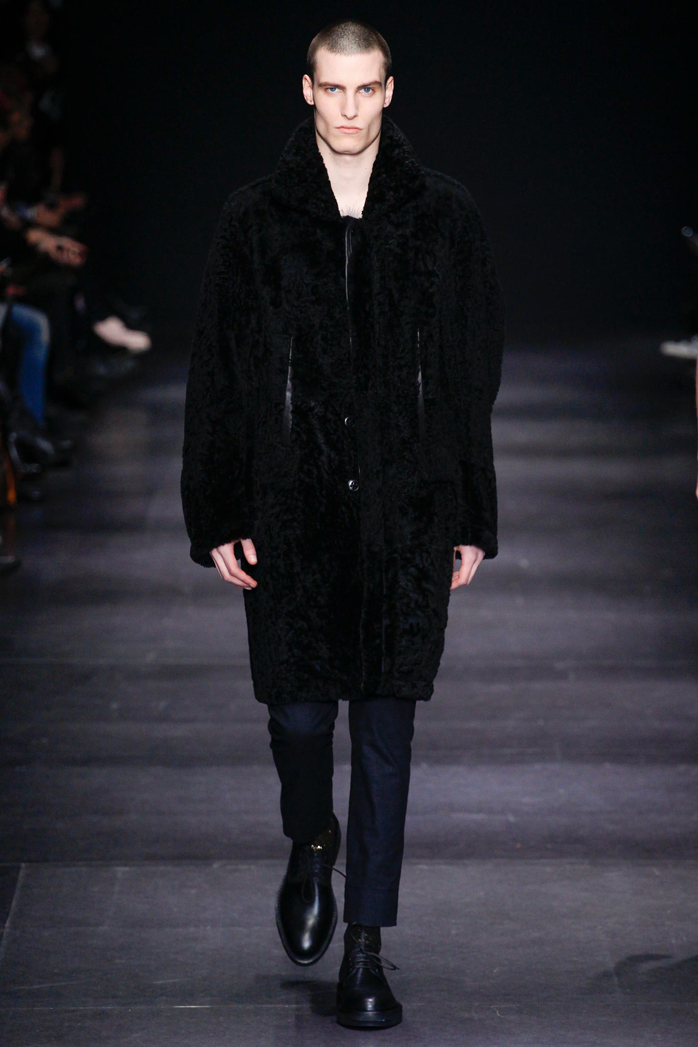 black faux-fur coat with slim pants