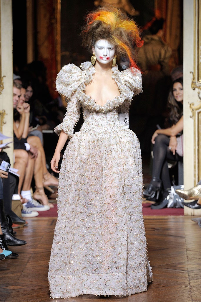 white silk ruffled gown