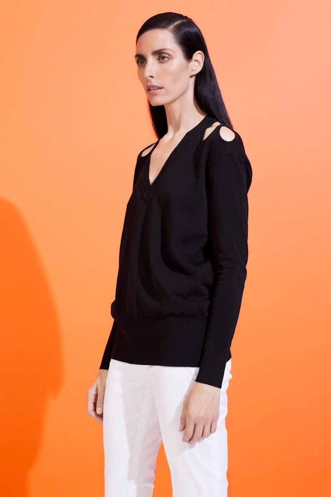 black top and white pants