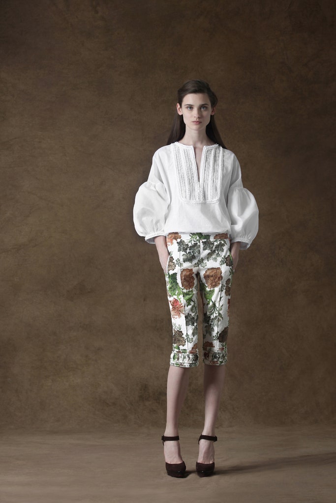 white relaxed blouse with floral pants