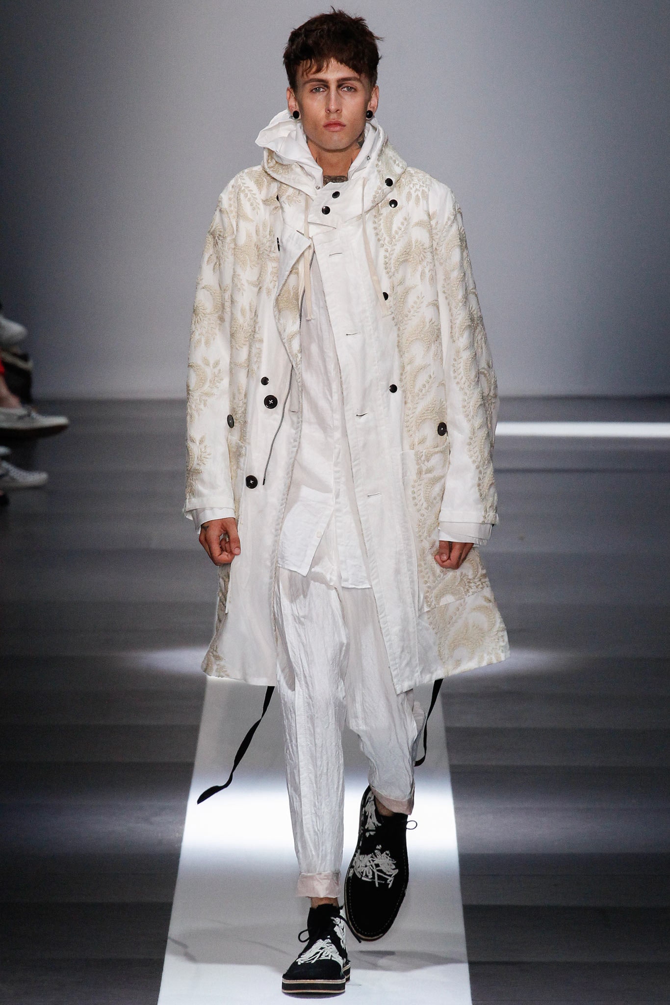 white embroidered coat with black shoes