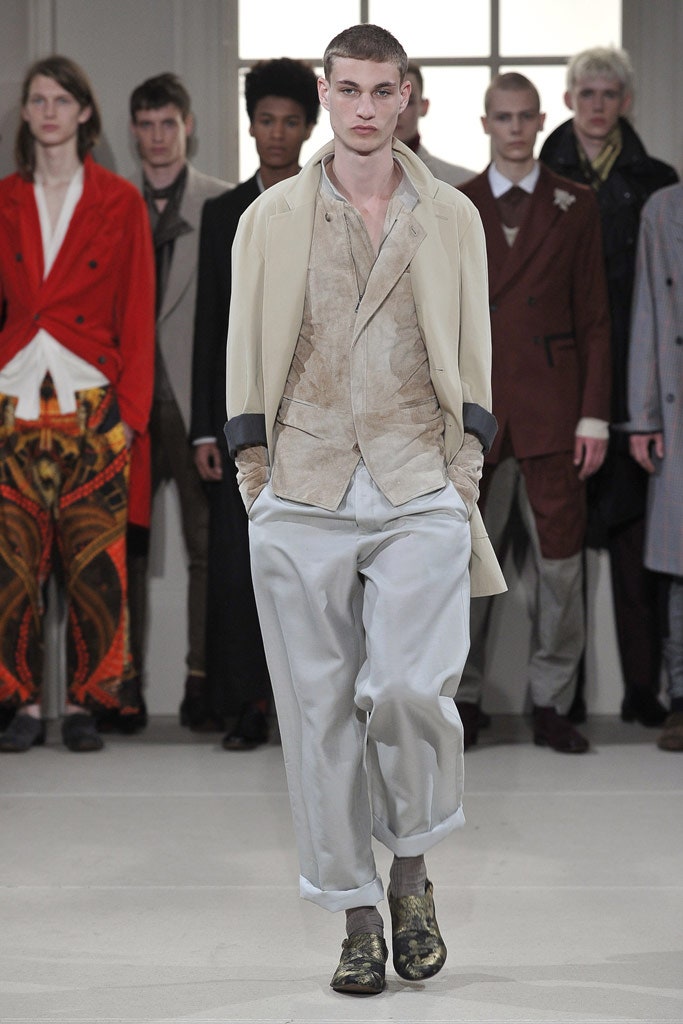 beige coat with tan shirt and gray pants