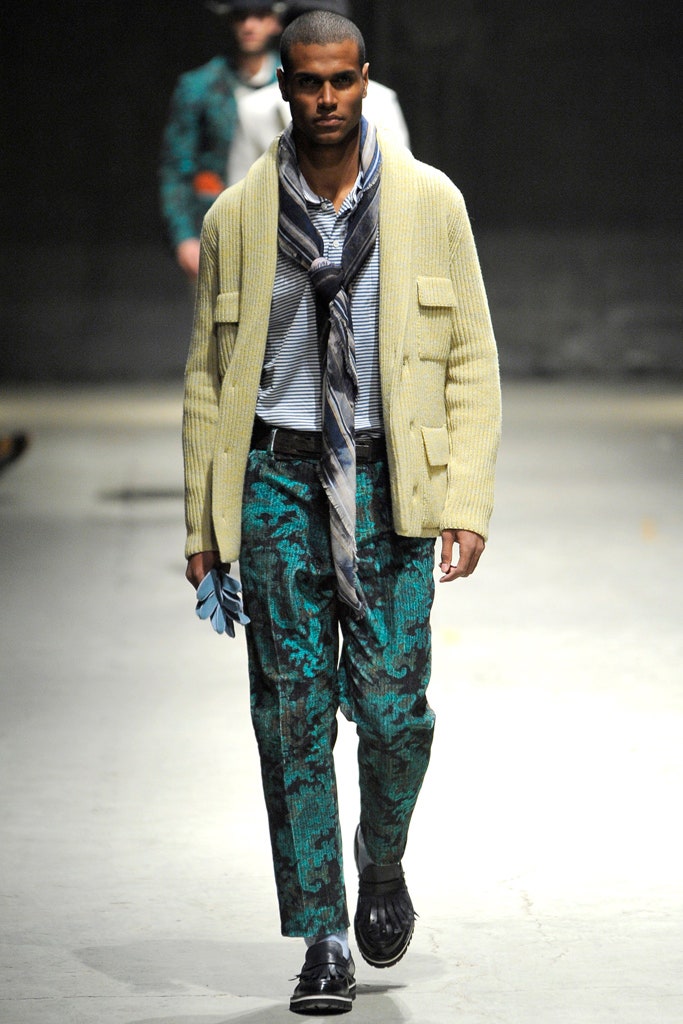 beige wool cardigan with printed green pants