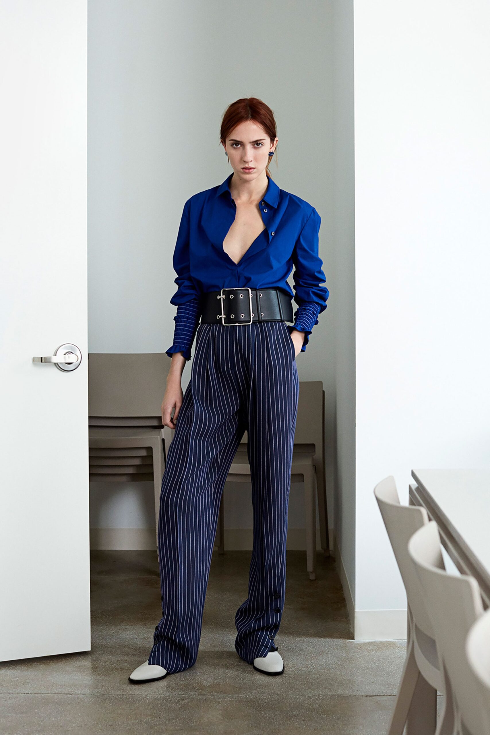 blue long-sleeve v-neck fitted shirt