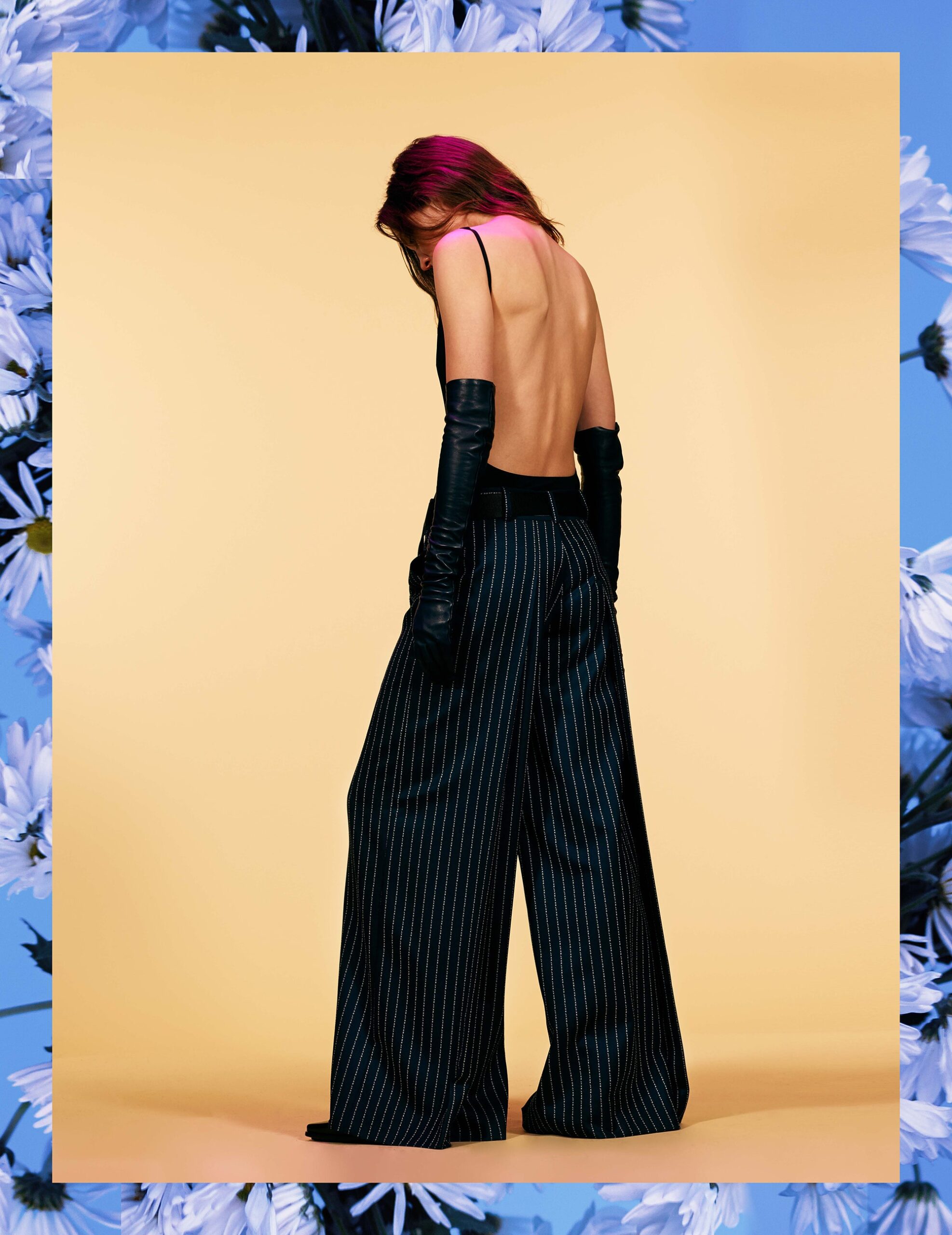 black silk backless top with striped pants