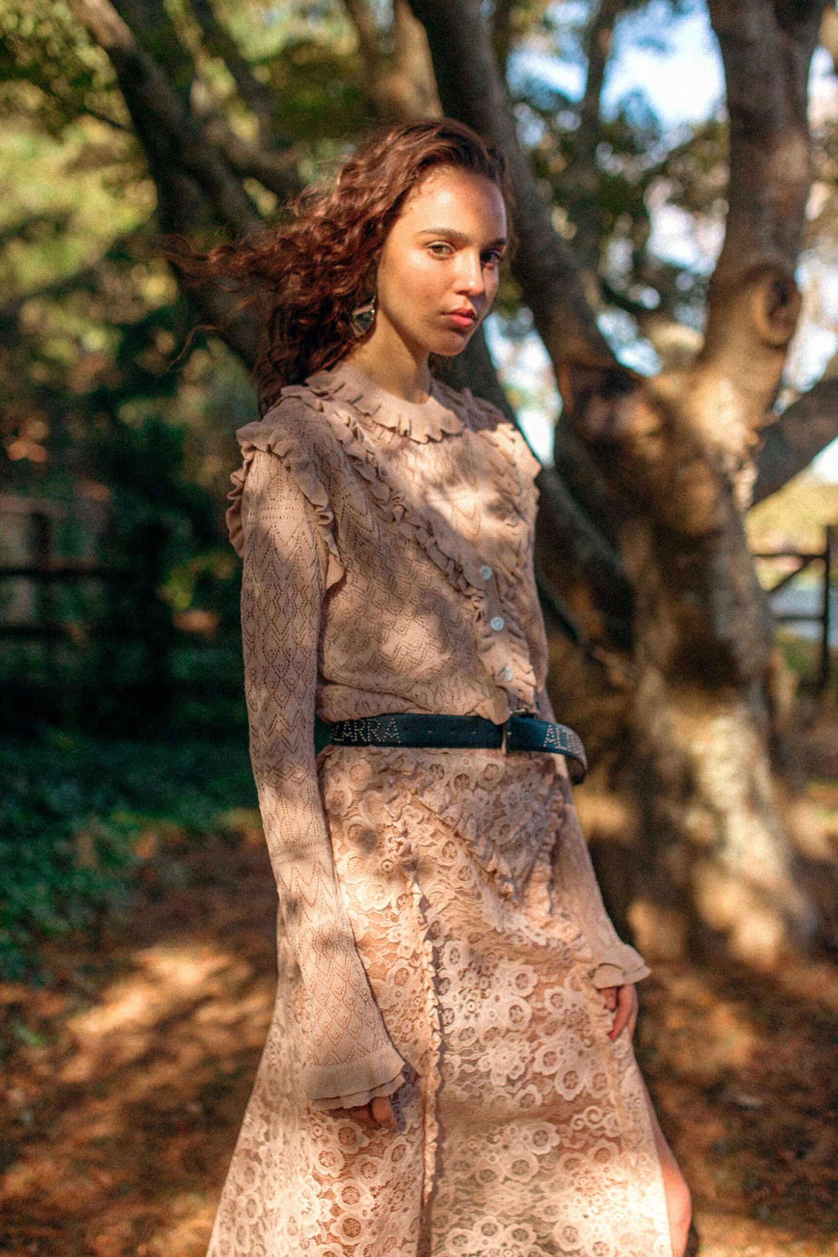 beige lace midi dress with black belt
