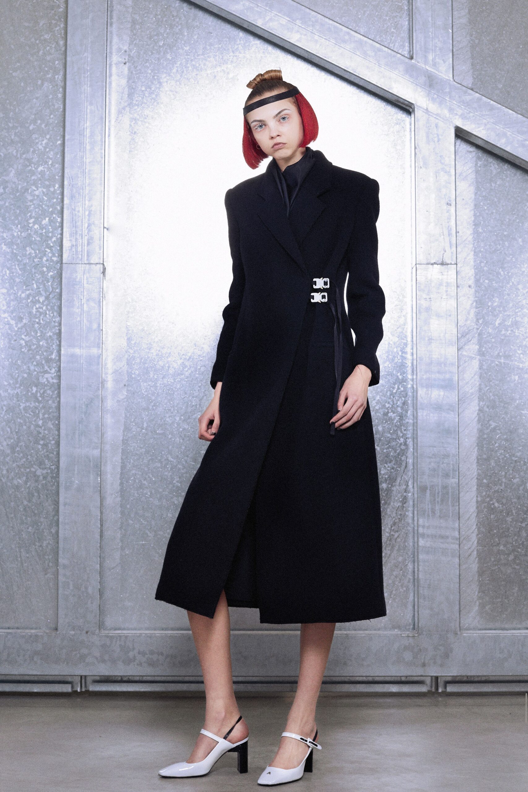 black wool fitted coat with white shoes