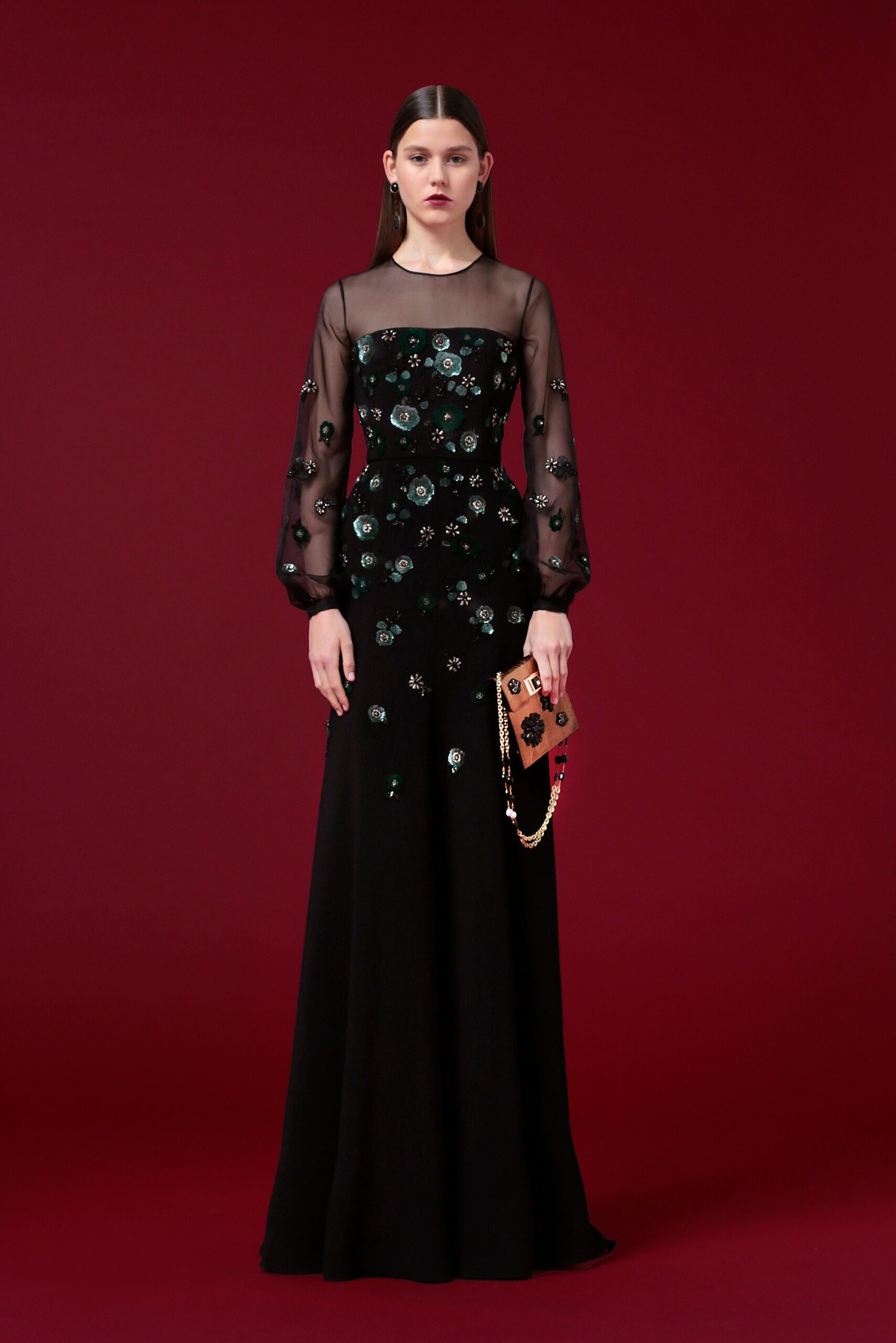black embellished gown with clutch