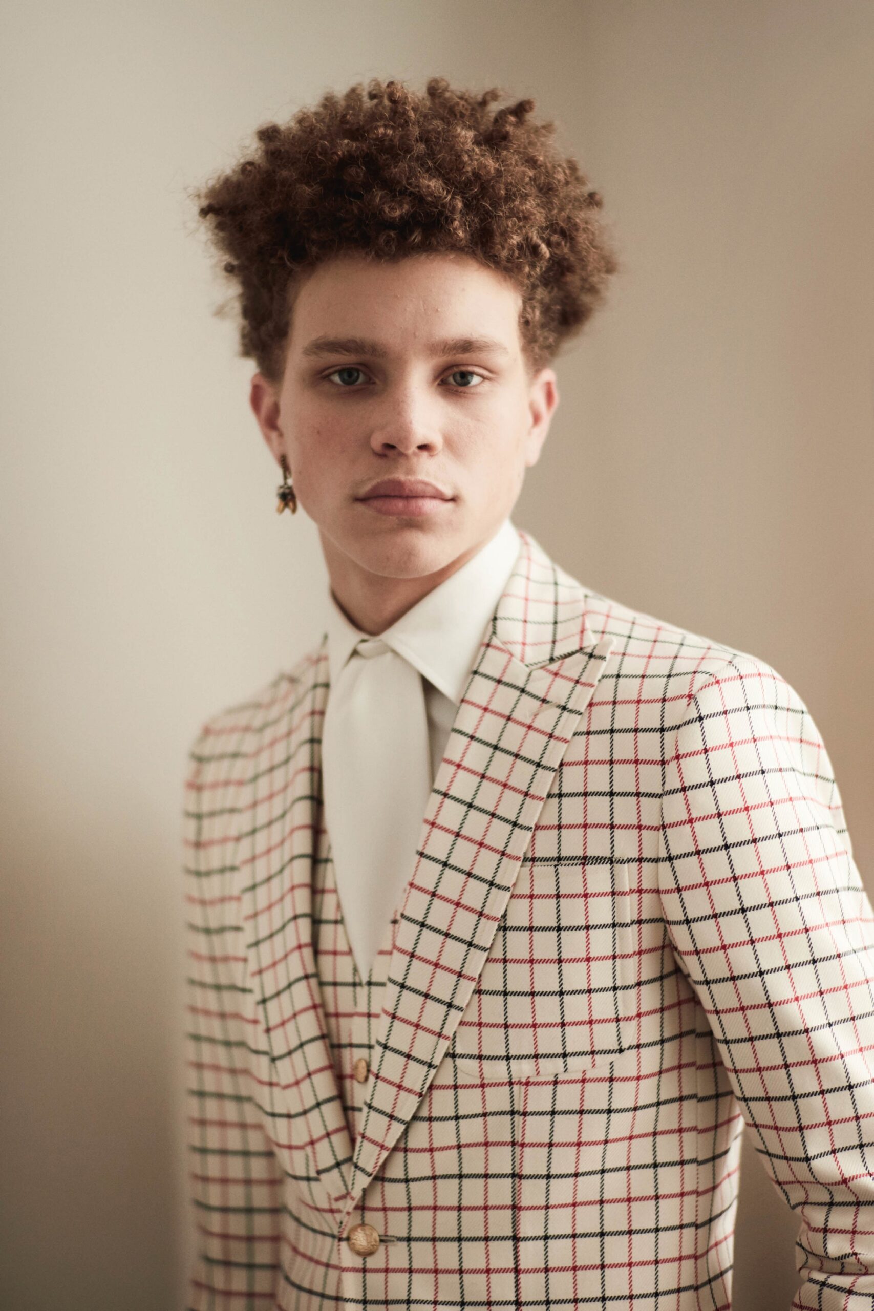 checked tailored suit with tie