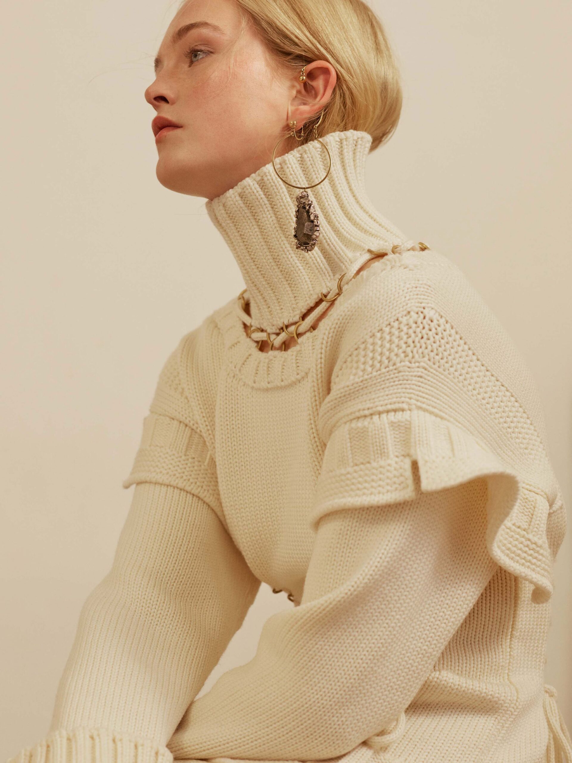 white relaxed high-neck sweater