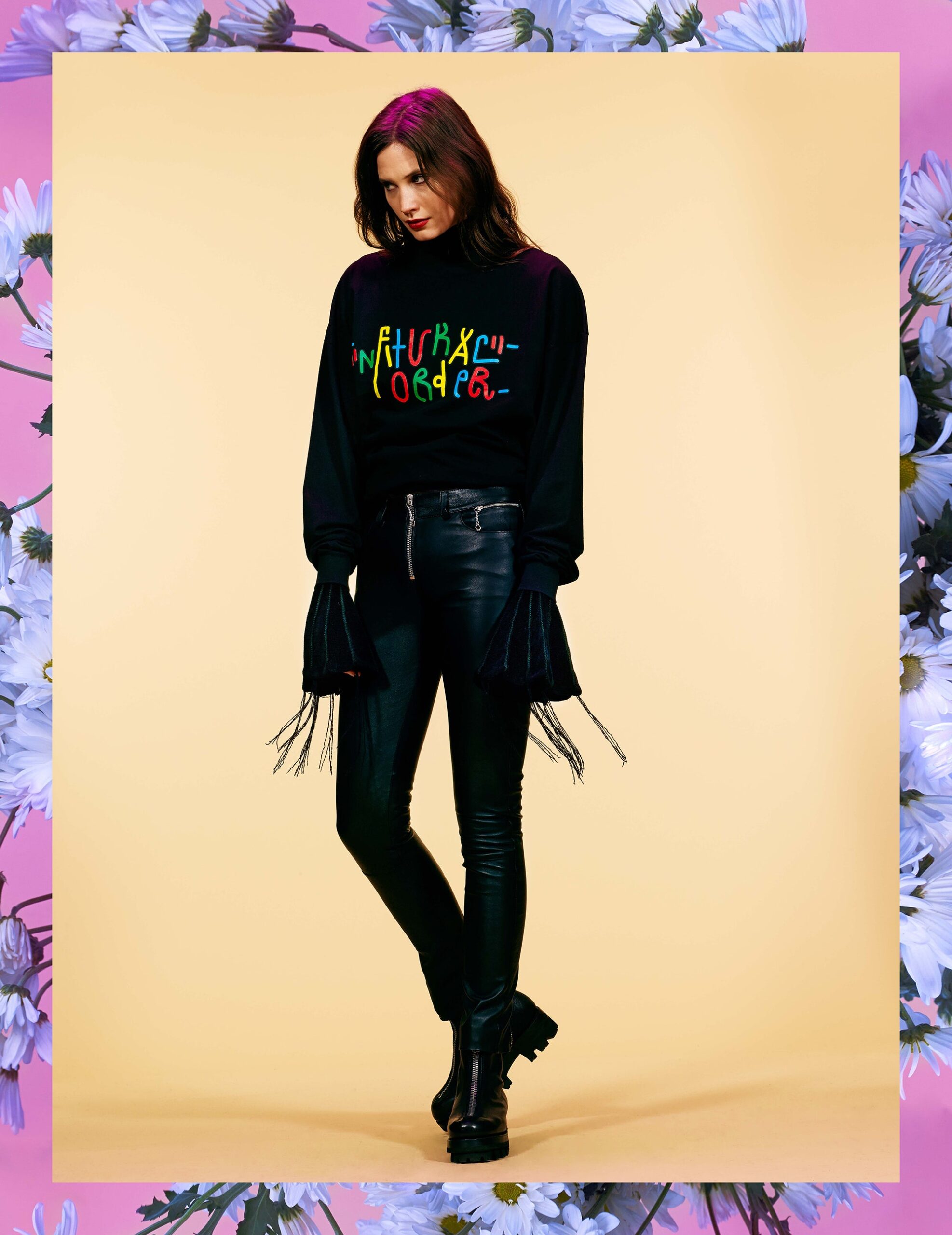 black fitted top with leather pants