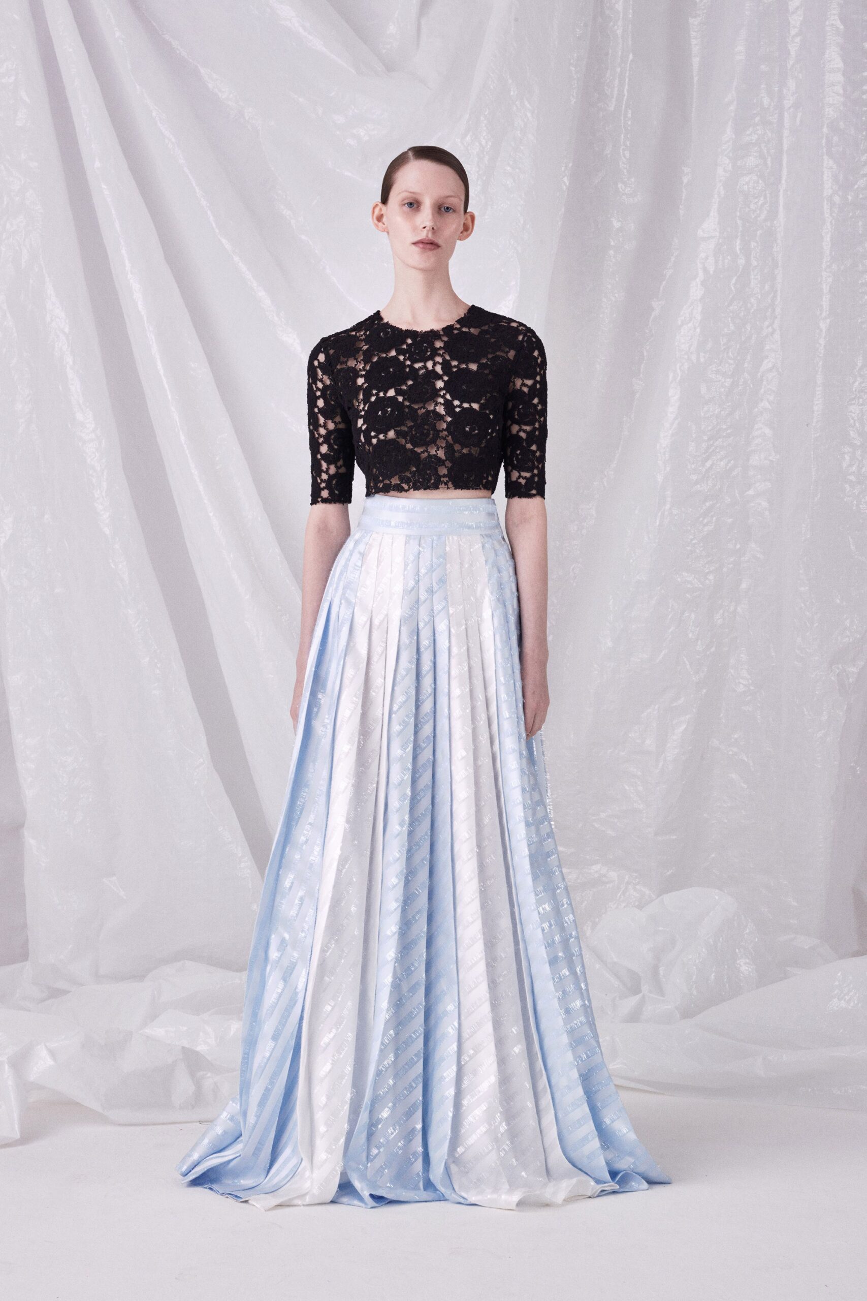 black lace top with pleated skirt