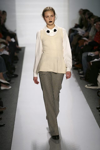 beige sleeveless top with checked pants