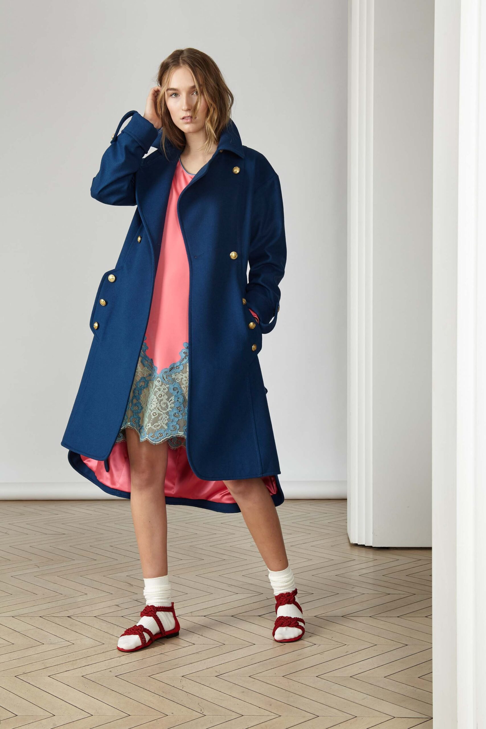 blue wool coat with pink dress