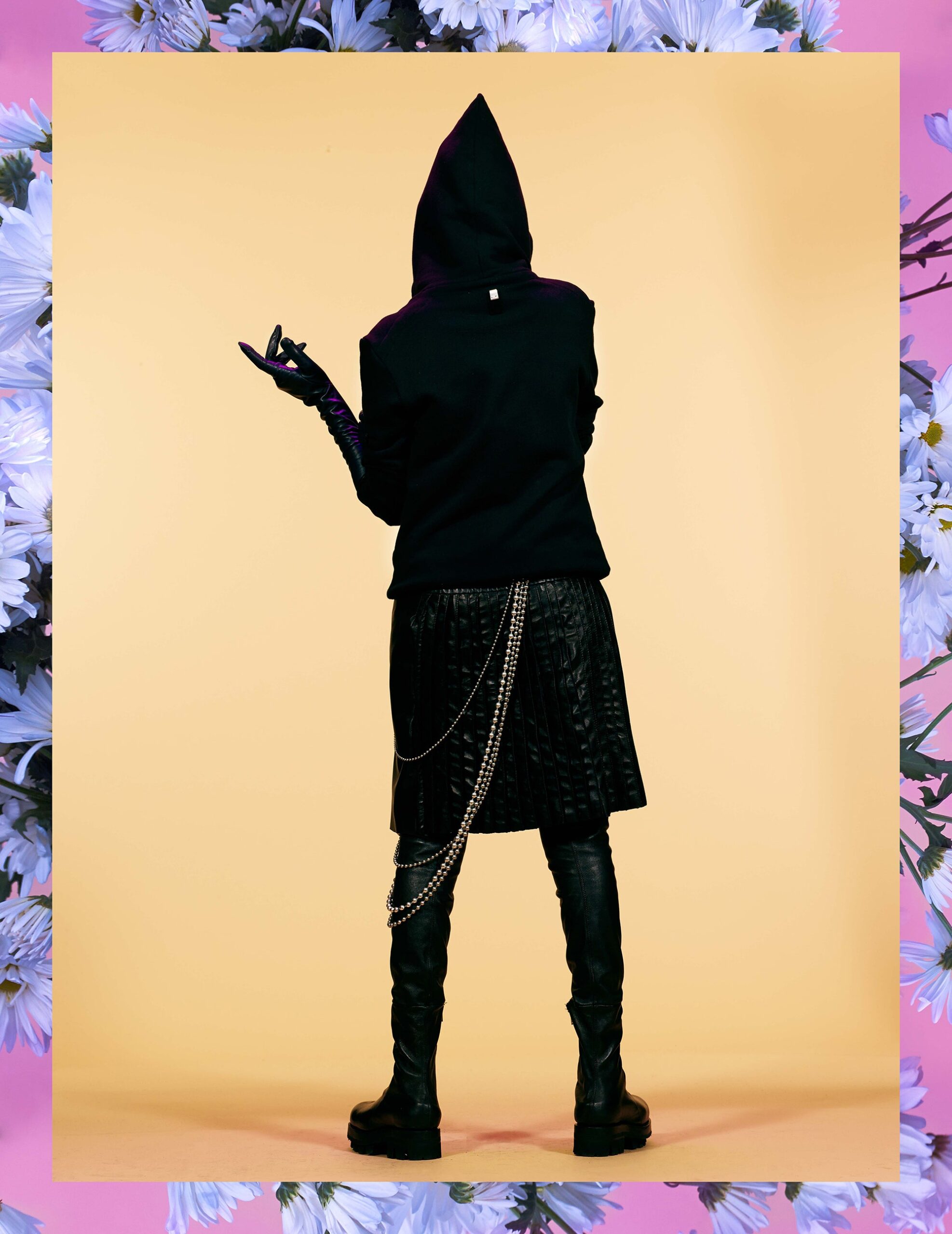 black hoodie with leather skirt