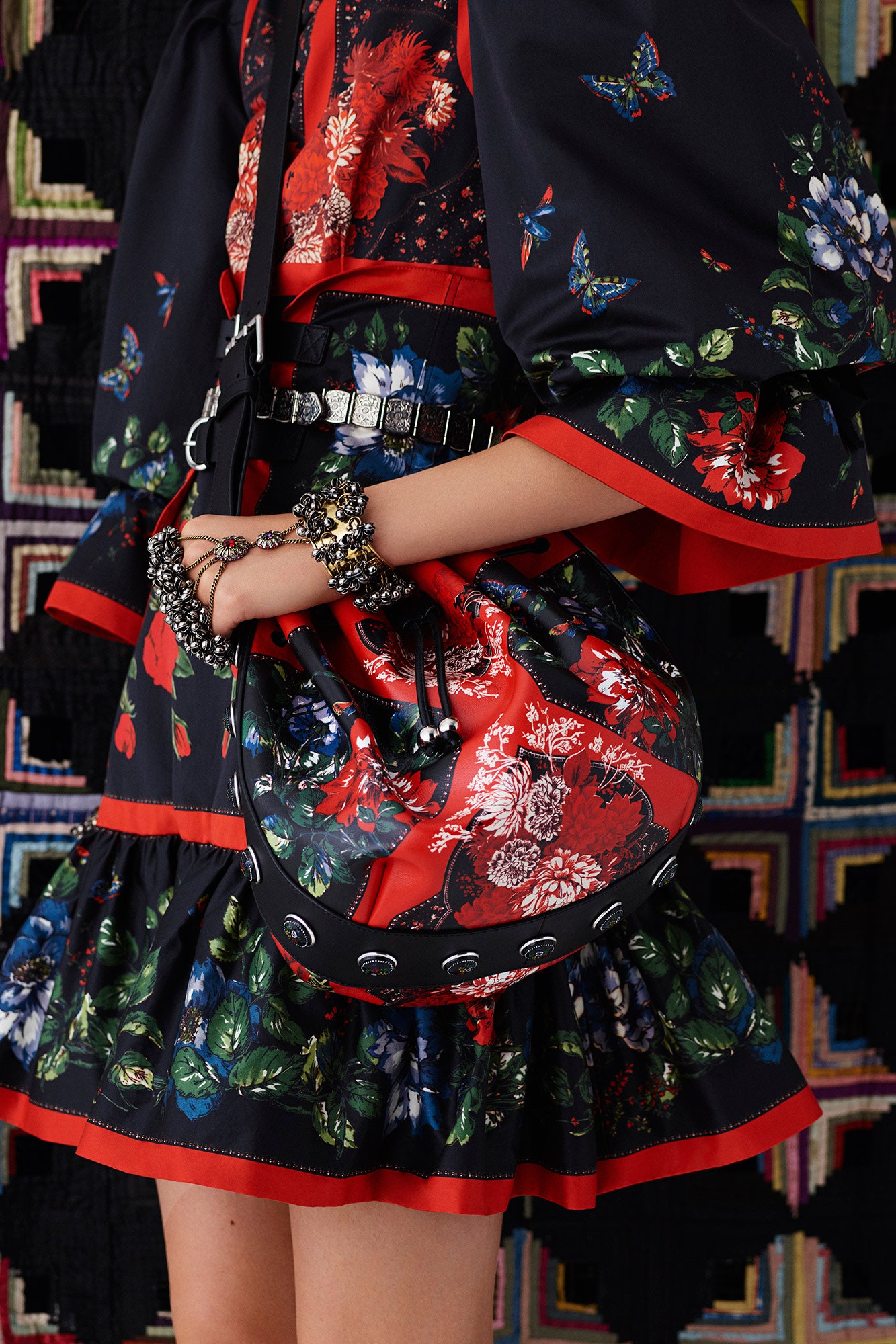 floral mini dress with black bag