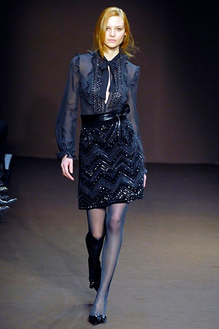 black silk blouse and sequined skirt