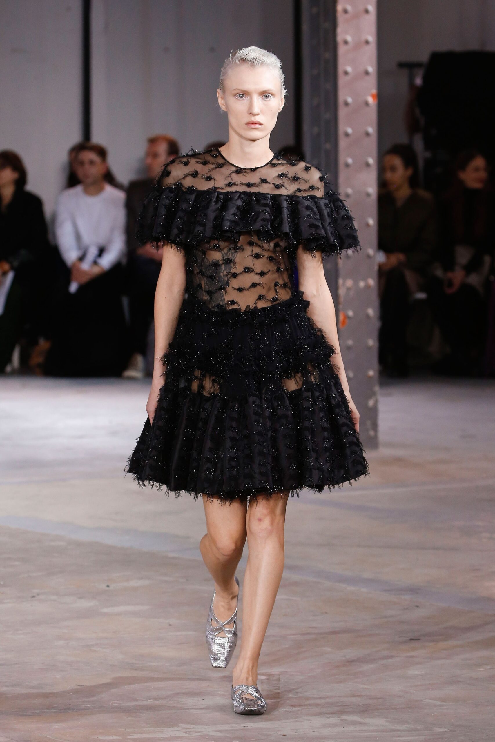 black ruffled mini dress
