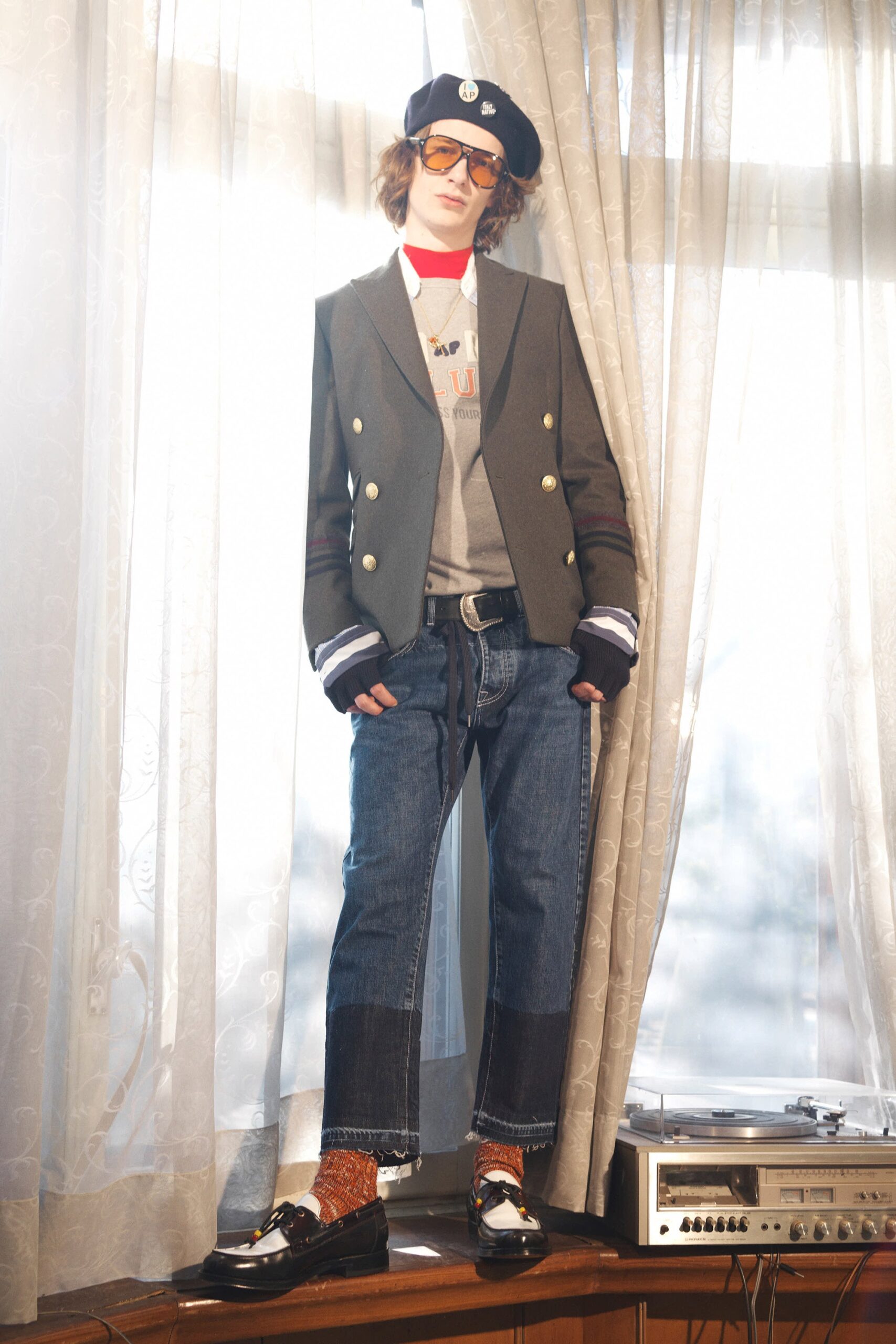 tailored black blazer with relaxed sweater