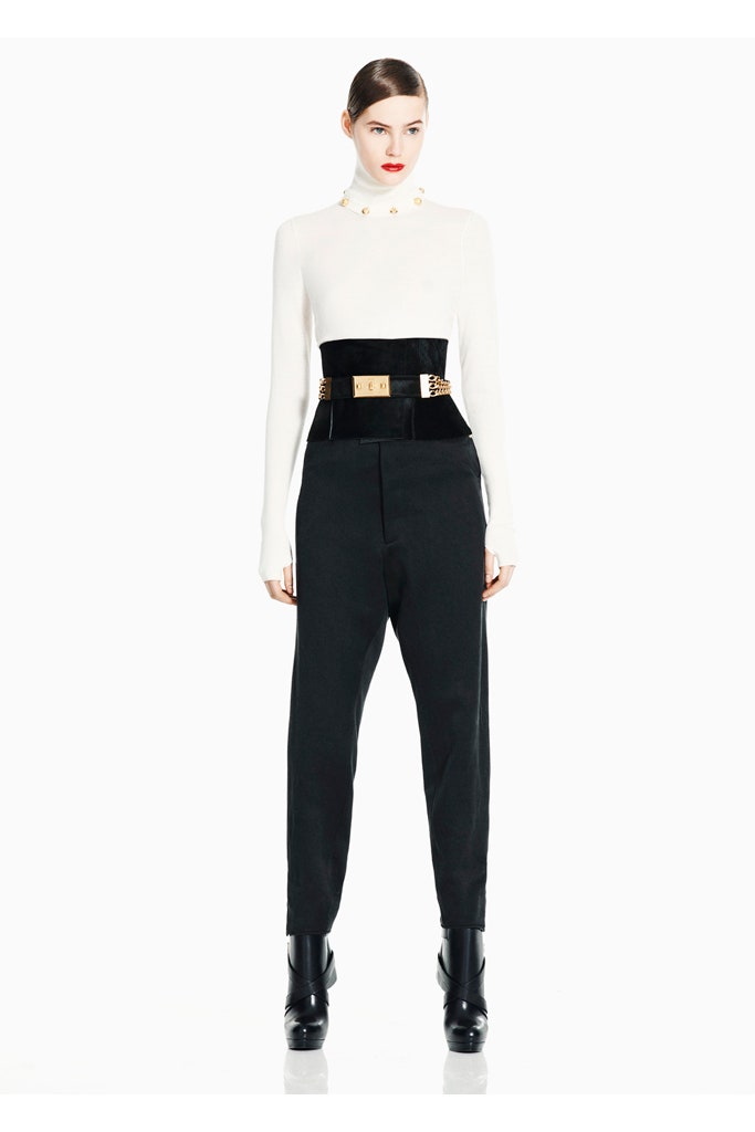 white fitted top with black tailored pants