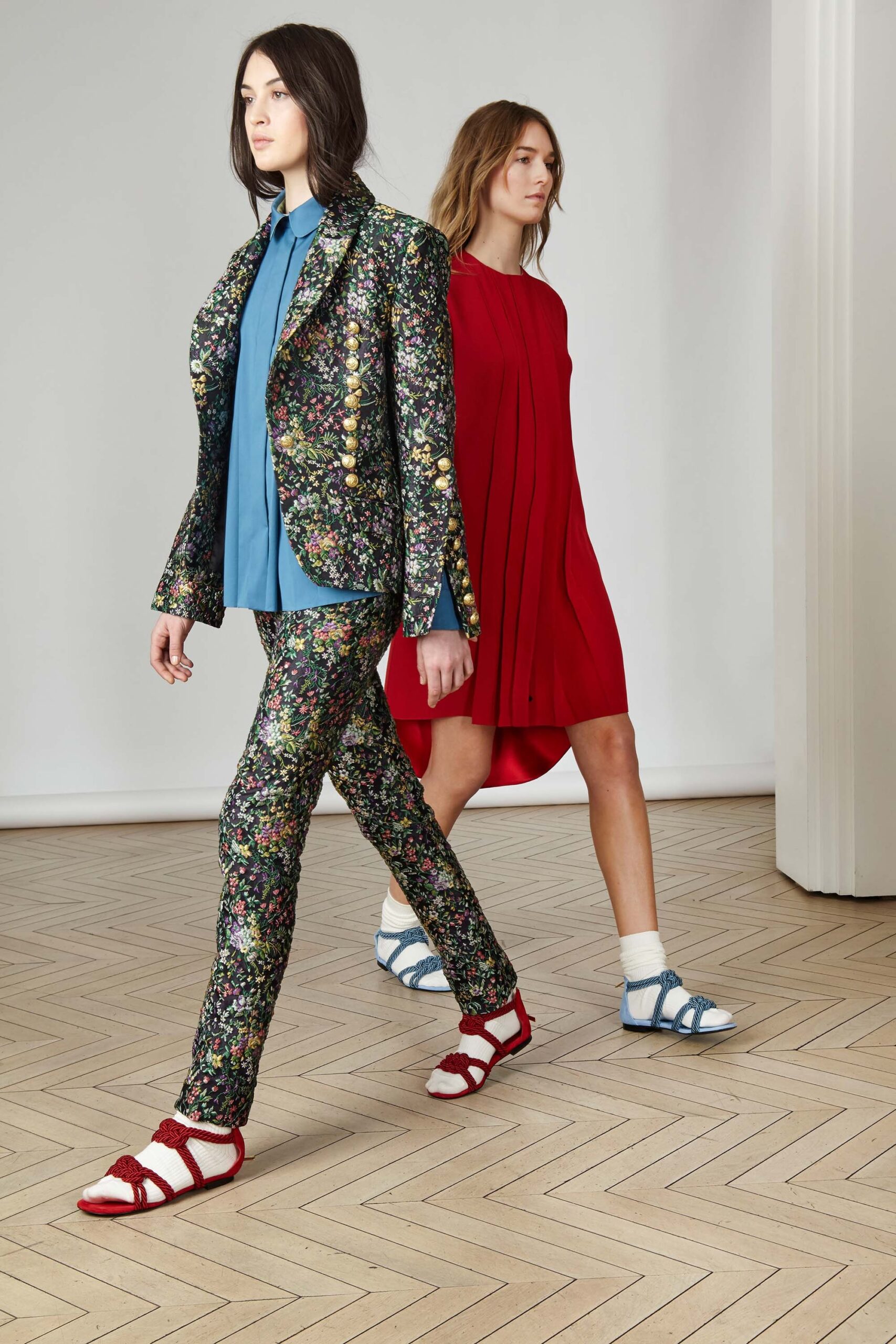 multi-colored tailored suit and red midi dress