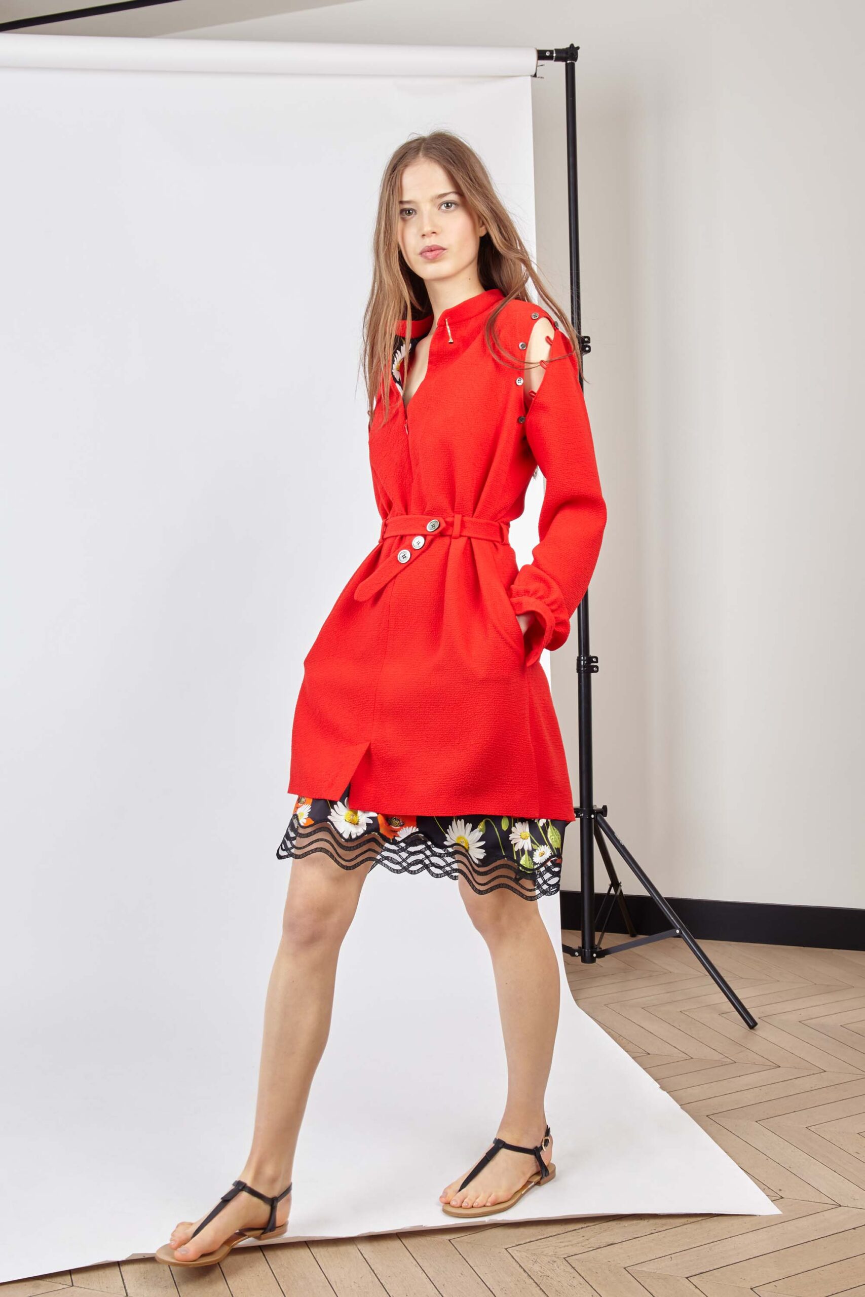 red fitted coat with multi skirt
