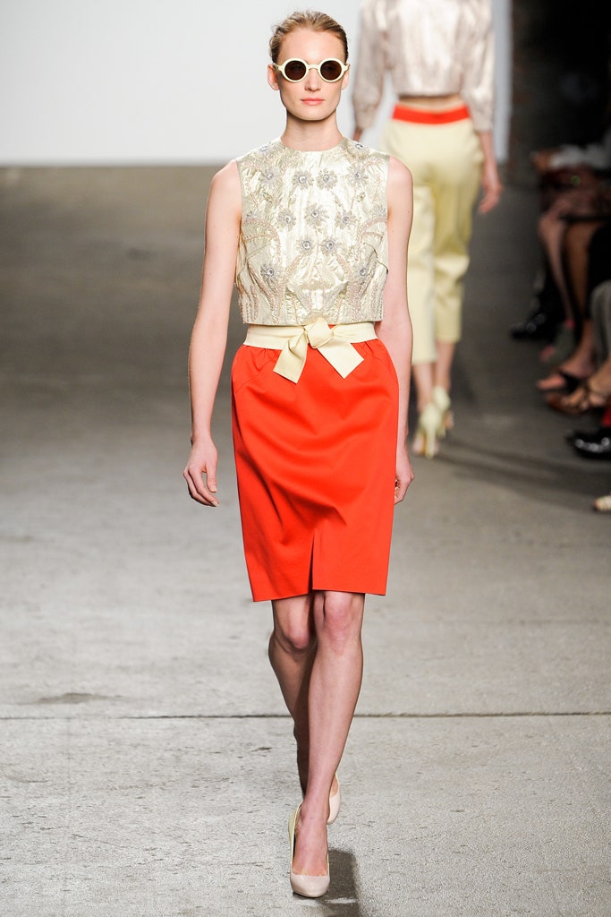ivory embroidered blouse and red pencil skirt