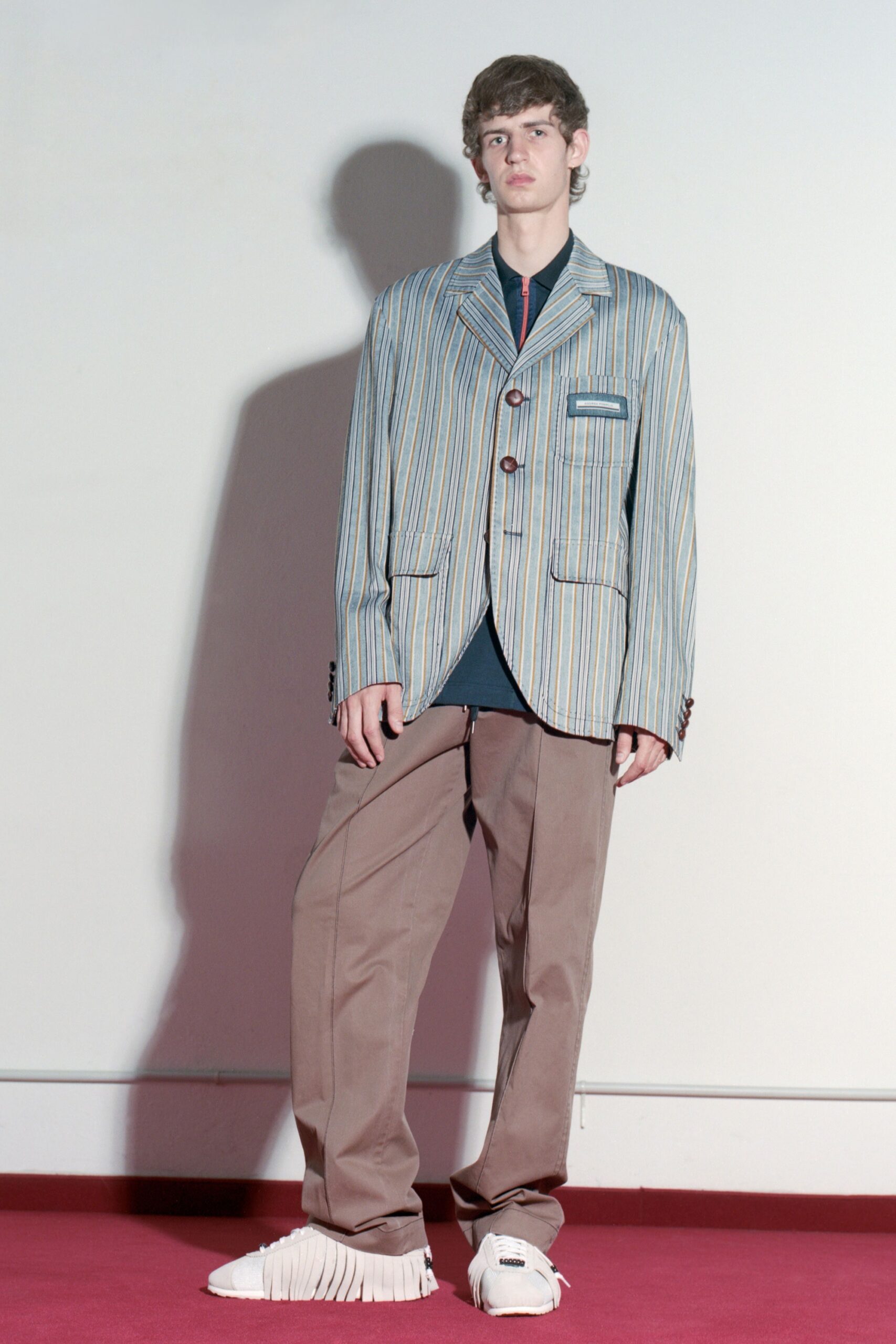 striped blazer with relaxed pants