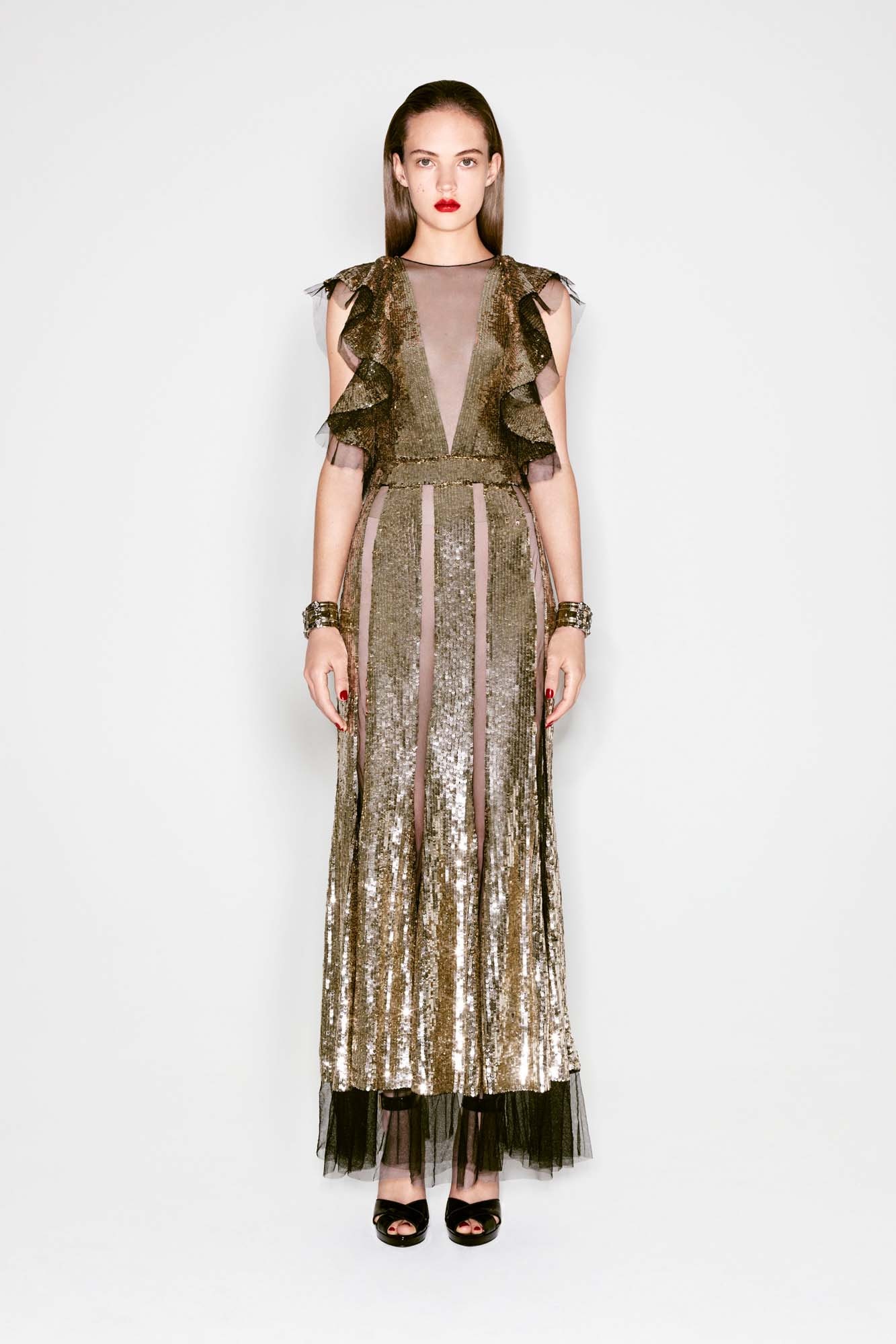 gold sequin sleeveless gown