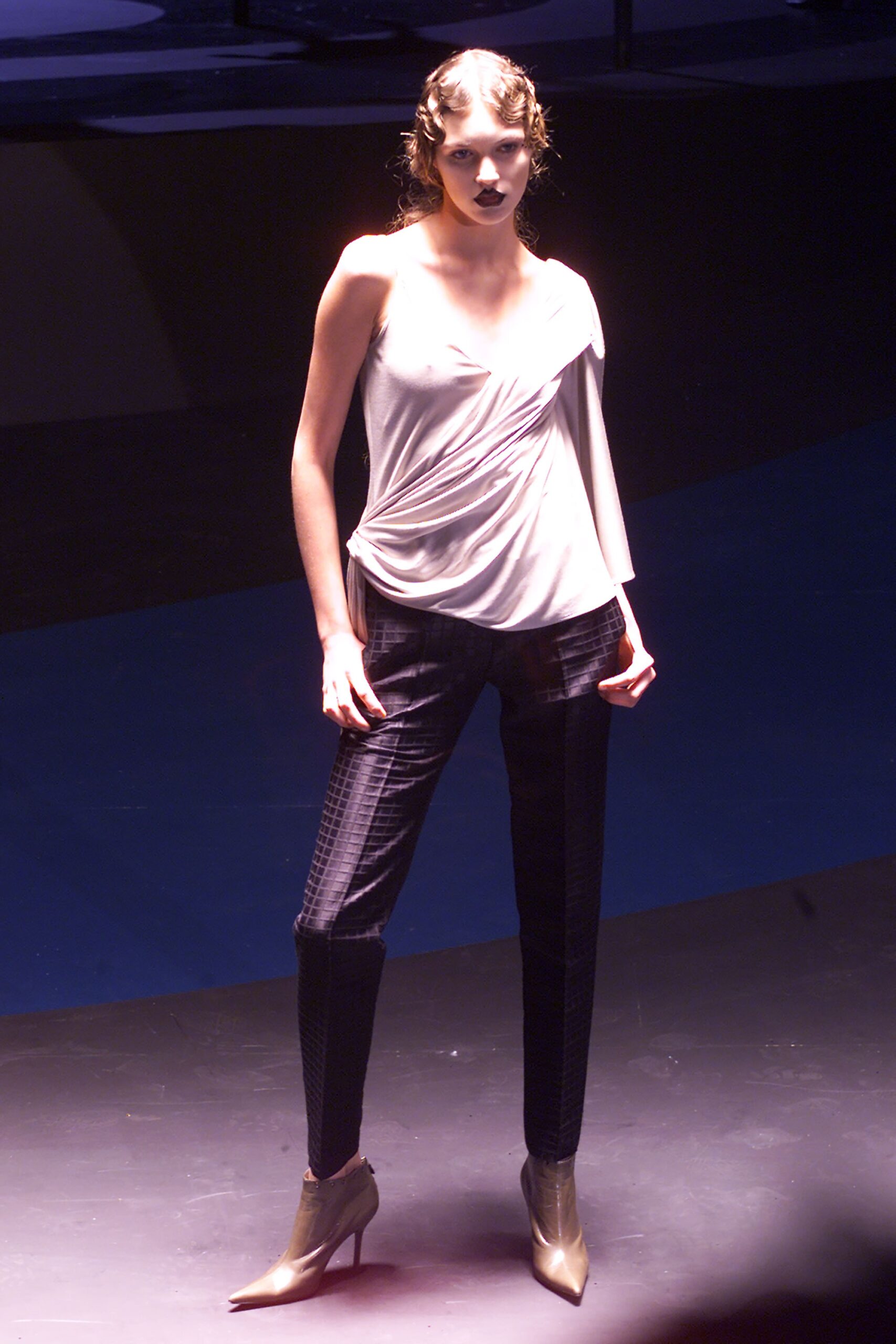 white asymmetric top with black pants