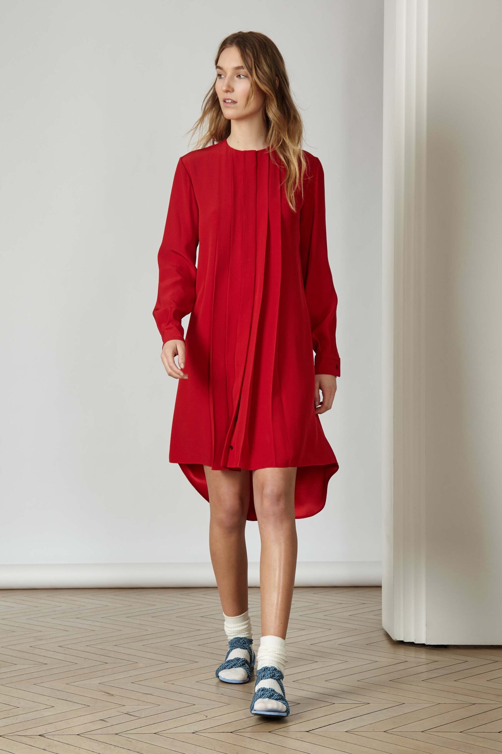 red pleated long-sleeve dress