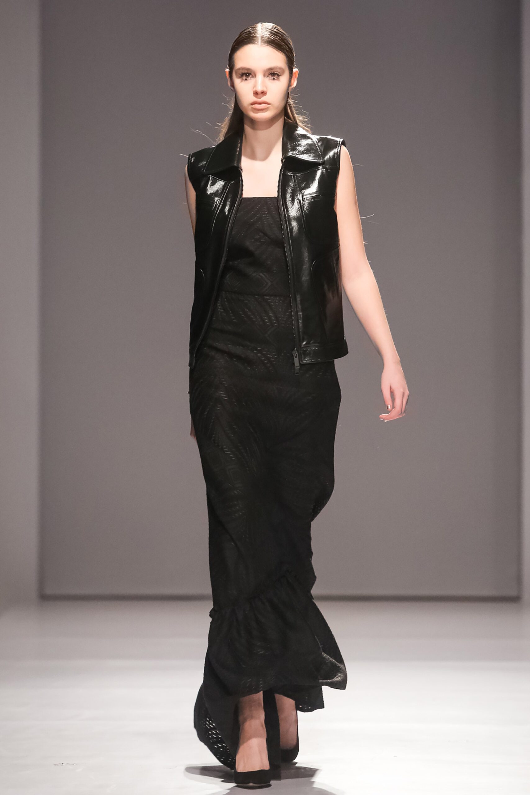 black silk maxi dress and leather vest