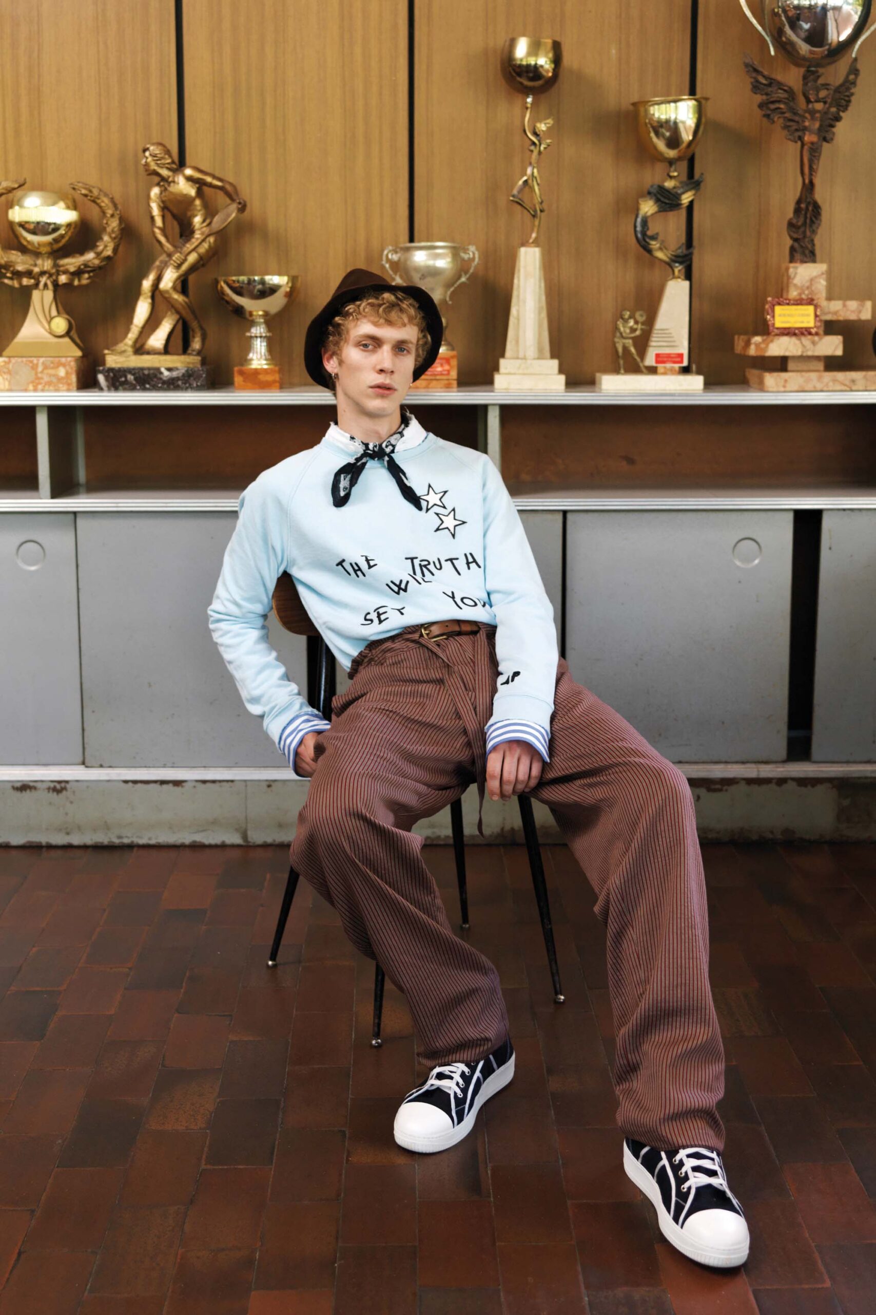 light blue relaxed shirt with brown pants