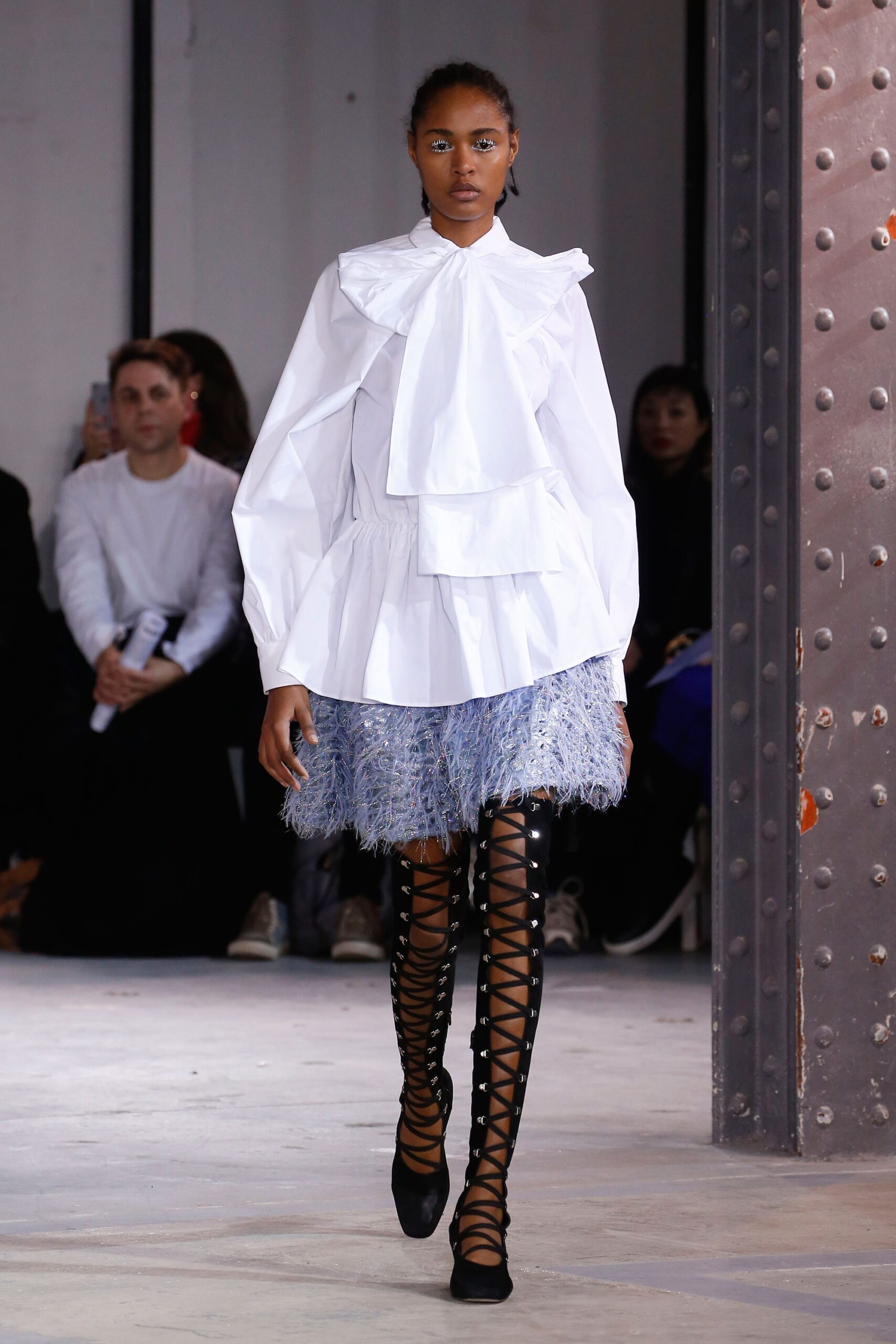 white blouse blue tiered skirt